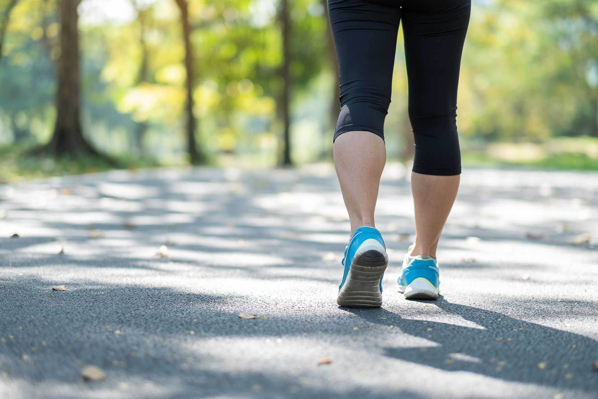 legs walking on a trail