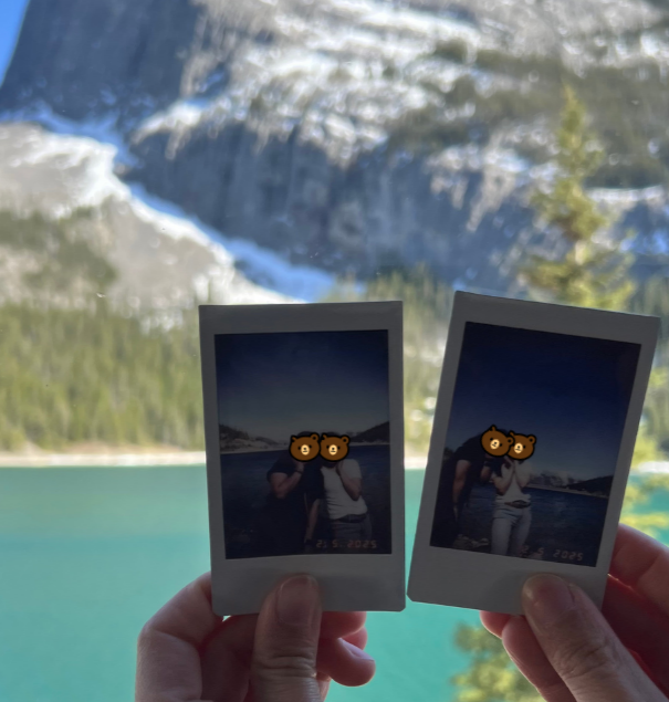 Close-up of a high-quality Instax photo capturing the Canmore Alpenglow, a signature gift for guests on Banff Bear Travel's photography tours.