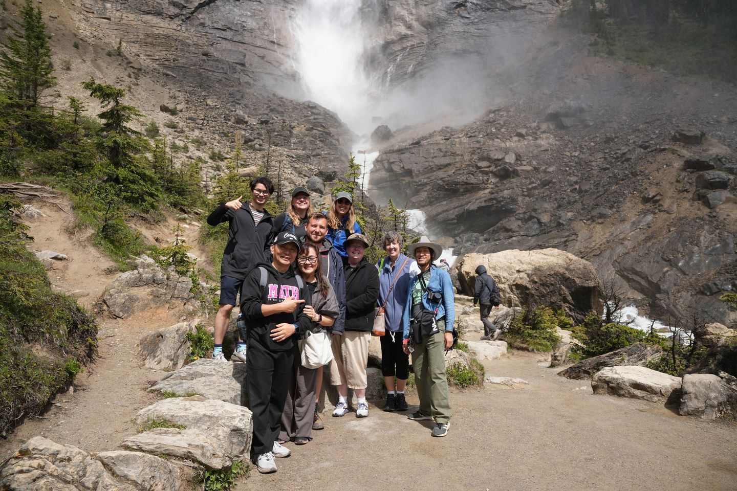 Happy guests on Banff Bear Travel small group tour, max 14 guests per tour from Calgary to Takkakaw Falls Yoho National Park
