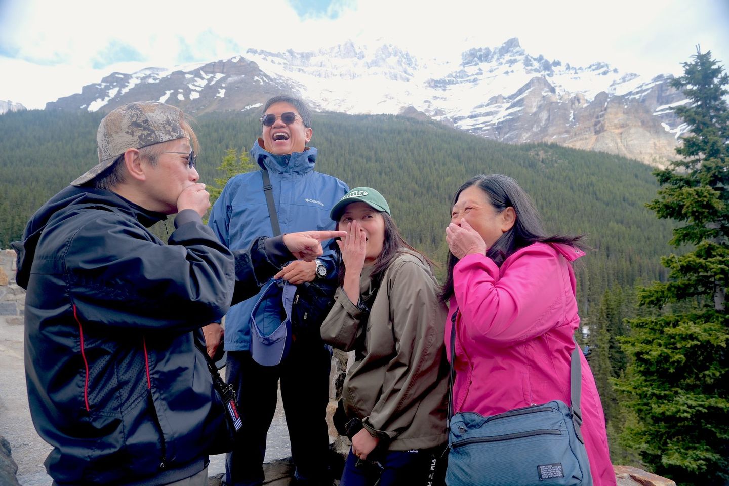 Happy guests on Banff Bear Travel small group tour, max 14 guests per tour from Calgary to Banff National Park