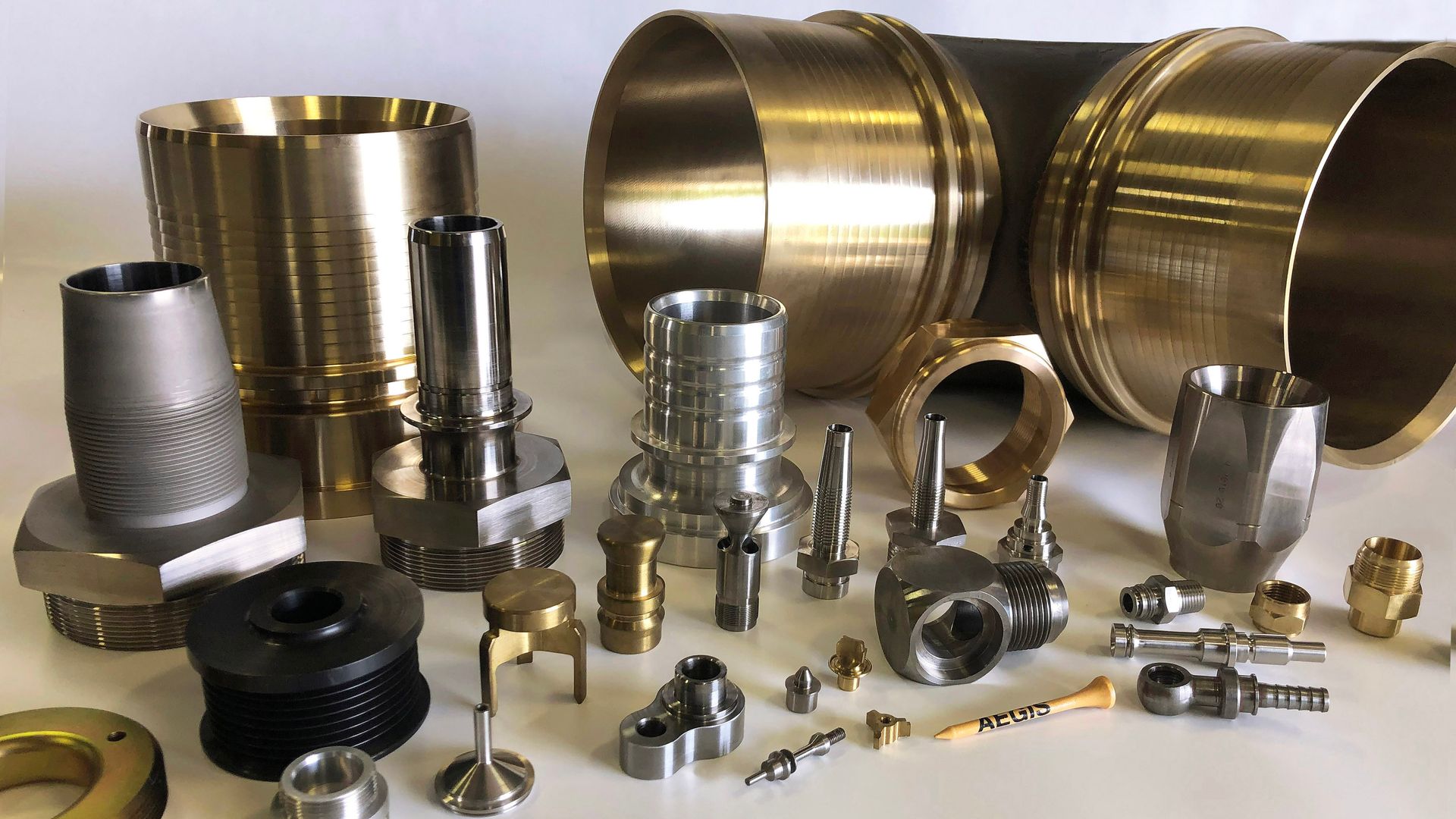 A bunch of metal parts are sitting on a table