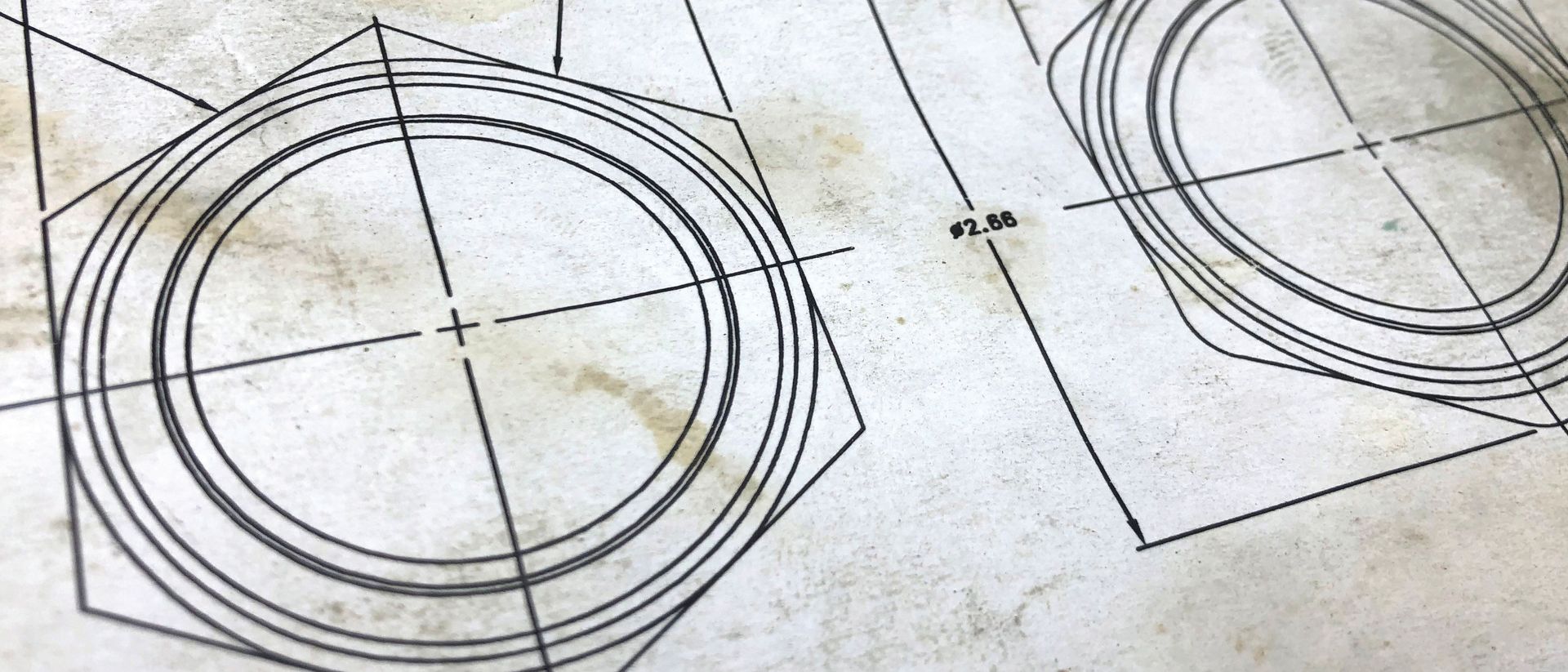 A close up of a drawing of two circles on a piece of paper