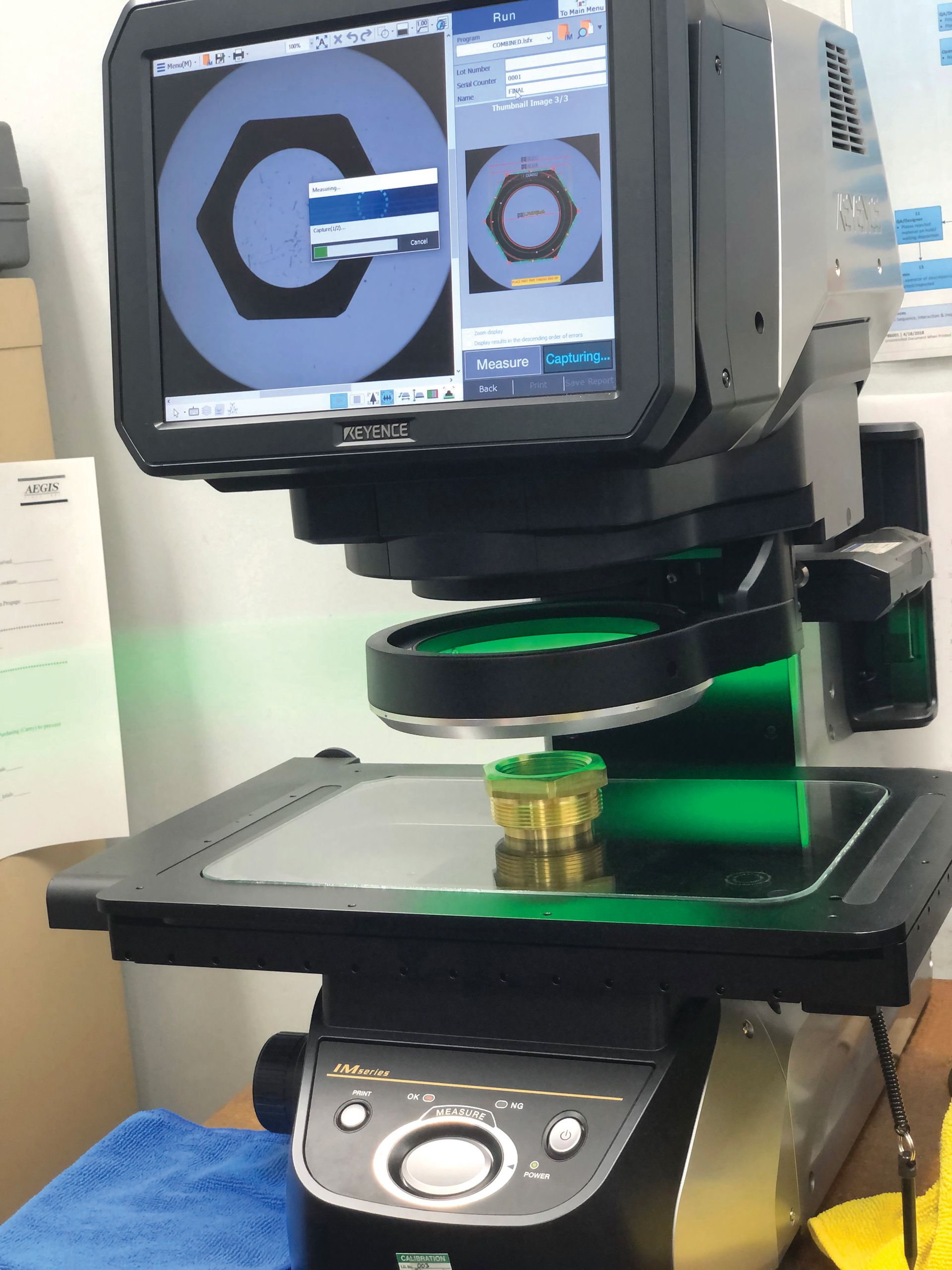 A microscope with the letter c on the screen
