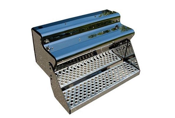 Shiny chrome truck steps. Three steps with a diamond plate pattern for grip.
