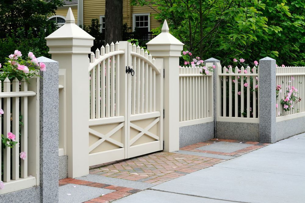 A Beige Picket Fence With Gate — Smiddy's Services In Bateau Bay, NSW