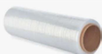 A roll of plastic wrap is sitting on a white surface.