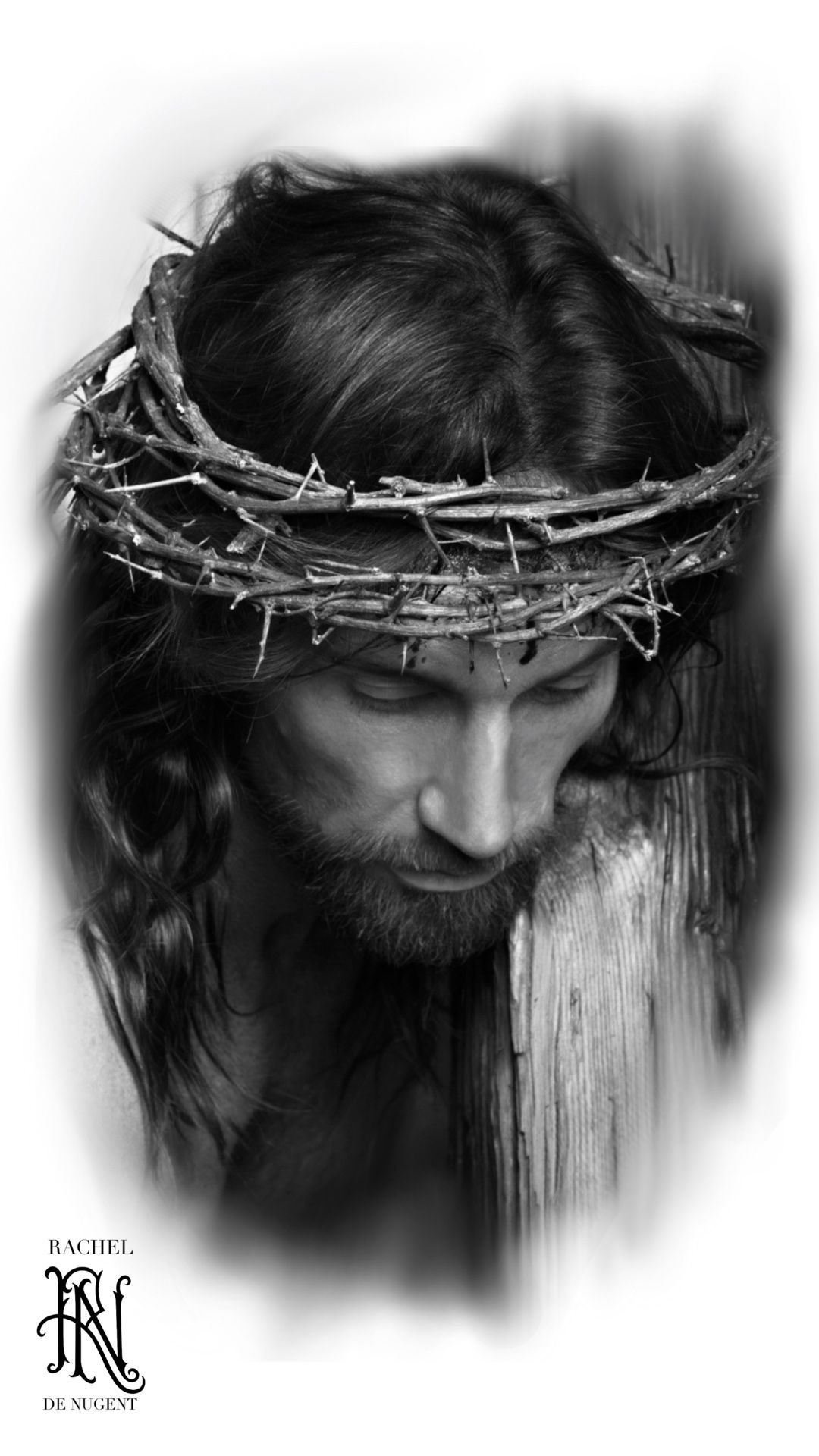 Black-and-white portrait of a person with bowed head and a crown of thorns, solemn expression.