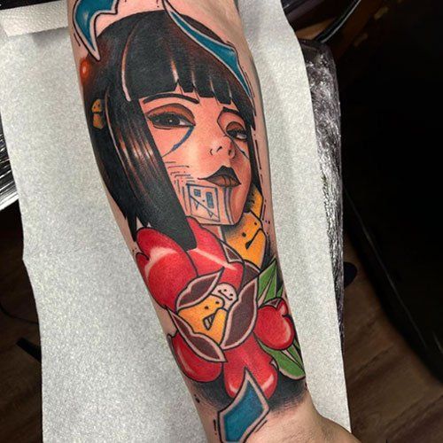 A person has a tattoo of a woman holding a rose on their forearm.