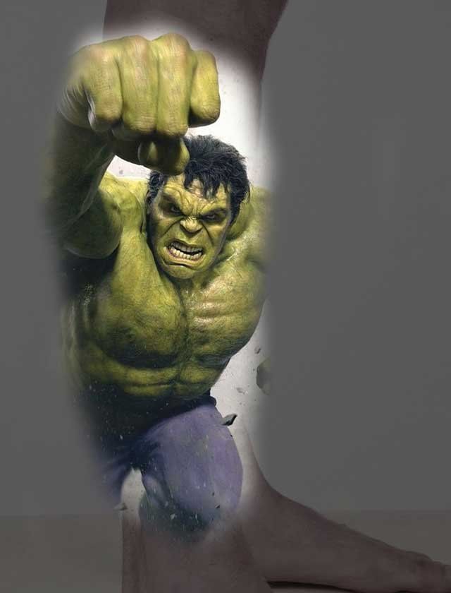 A close up of a person 's leg with a picture of the hulk on it.