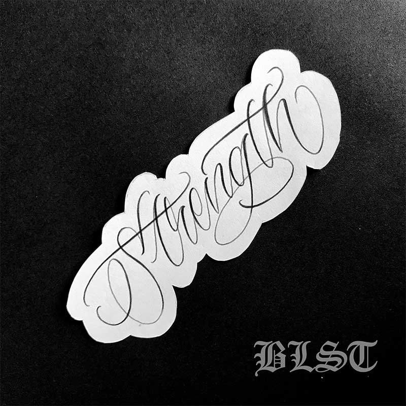 A piece of paper with the word strength written on it