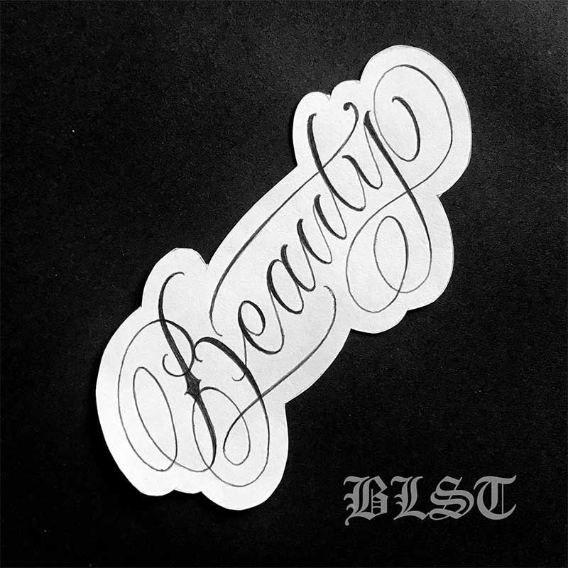 A black and white drawing of the word beauty