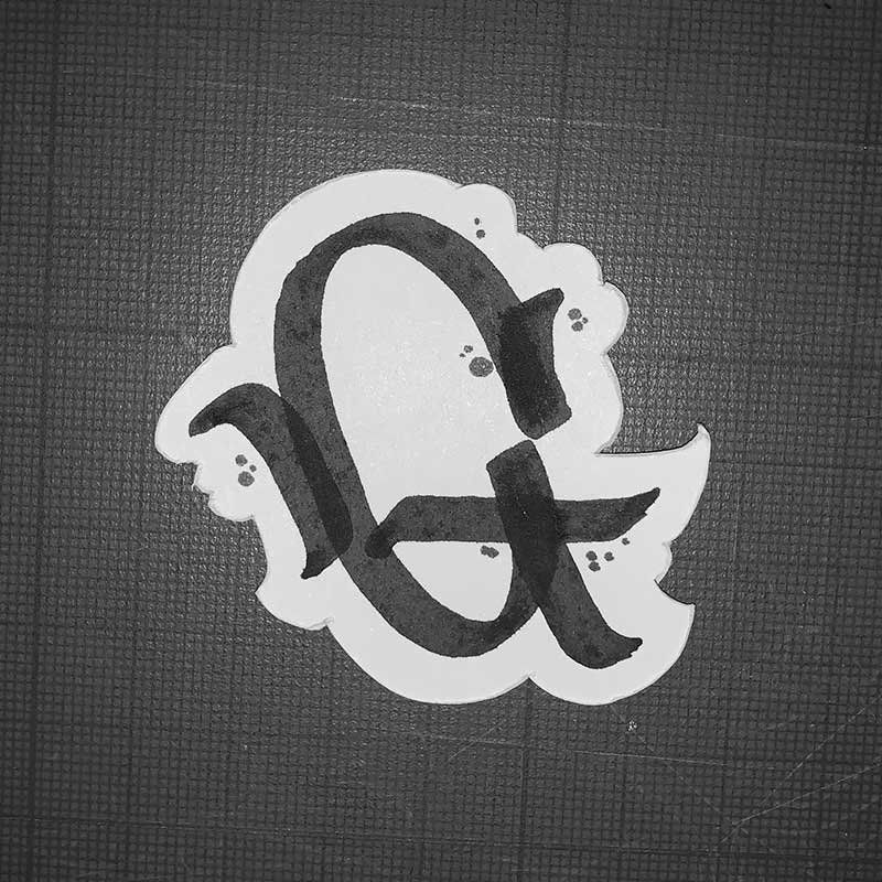 A black and white drawing of the letter g