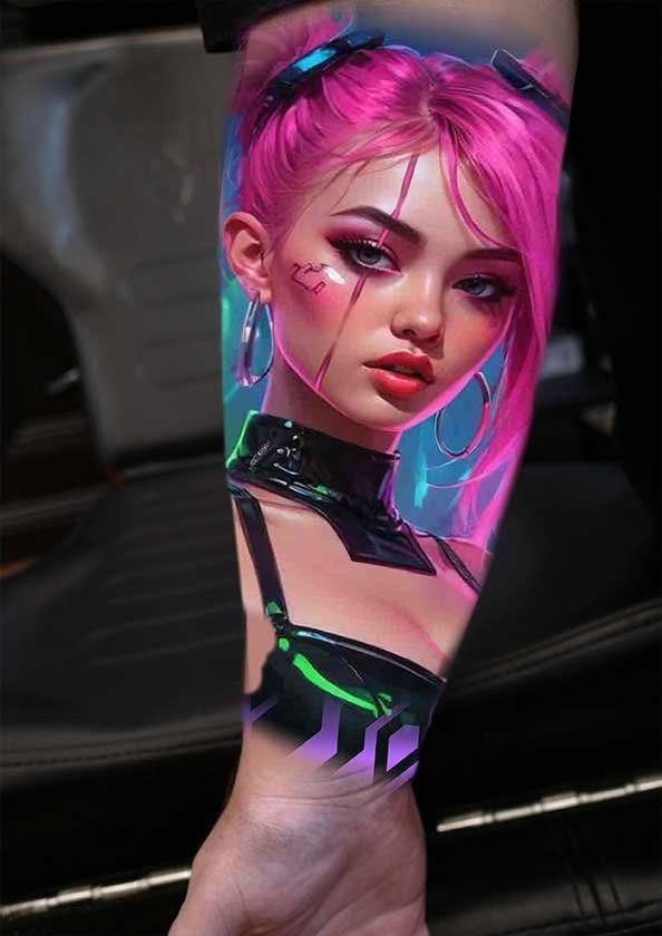 A woman with pink hair has a tattoo on her arm.