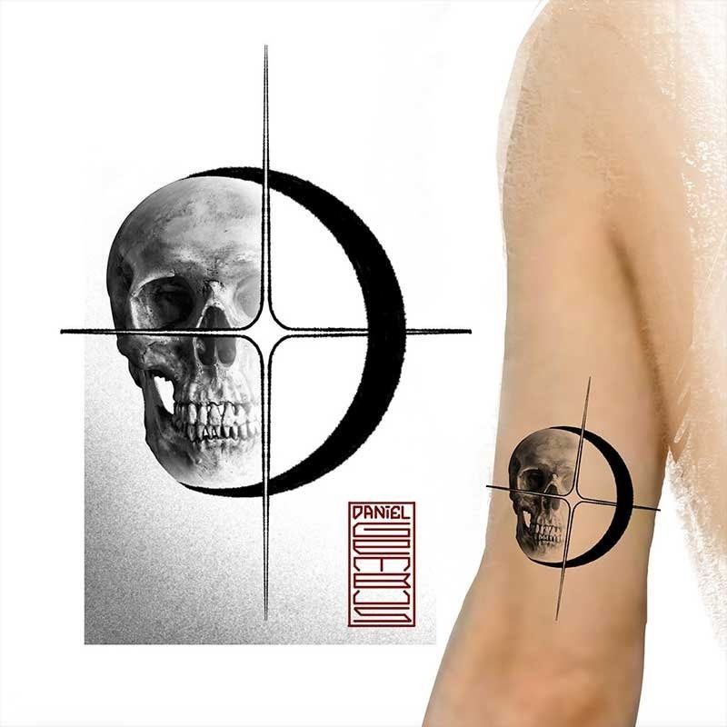 A tattoo of a skull and a crescent moon on a person 's arm