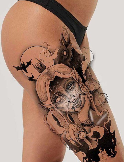 A woman has a tattoo of a witch on her leg