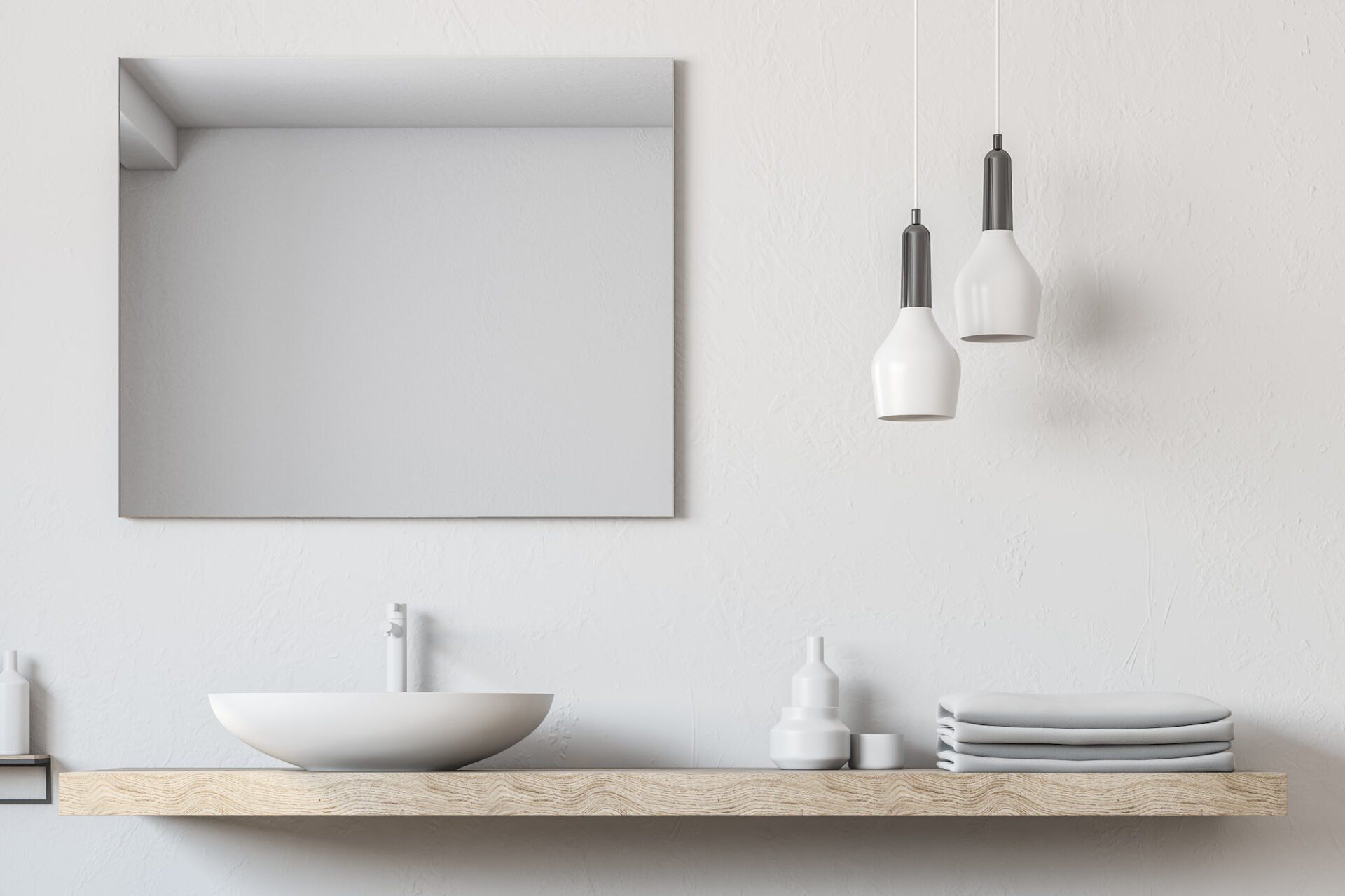 A bathroom with a sink , mirror and a shelf.