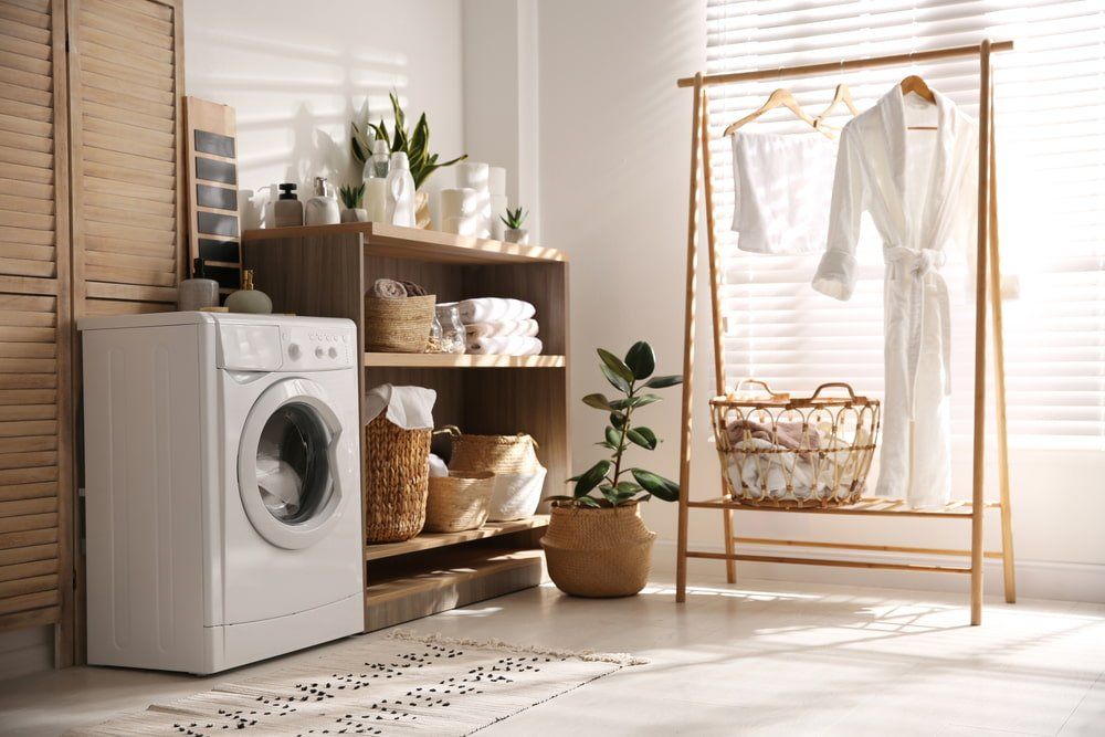 Laundry Room With Wood Shelving — Bathroom & Laundry Renovations in Coomera, QLD