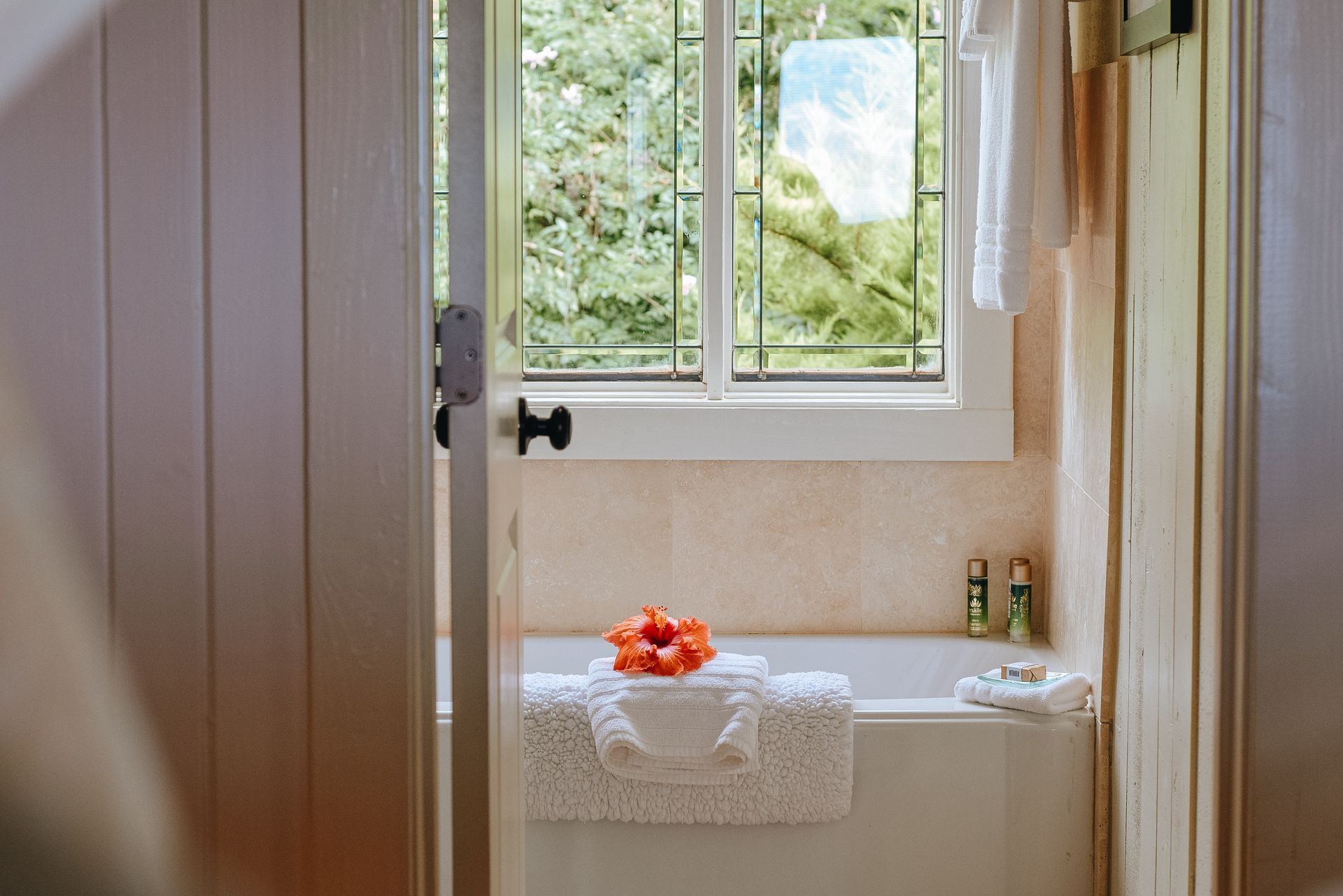 Flowers and tiles in a new bathroom, installed in a day.