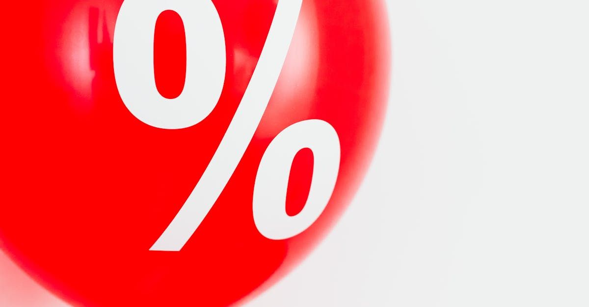 A red balloon with a percent sign on it.