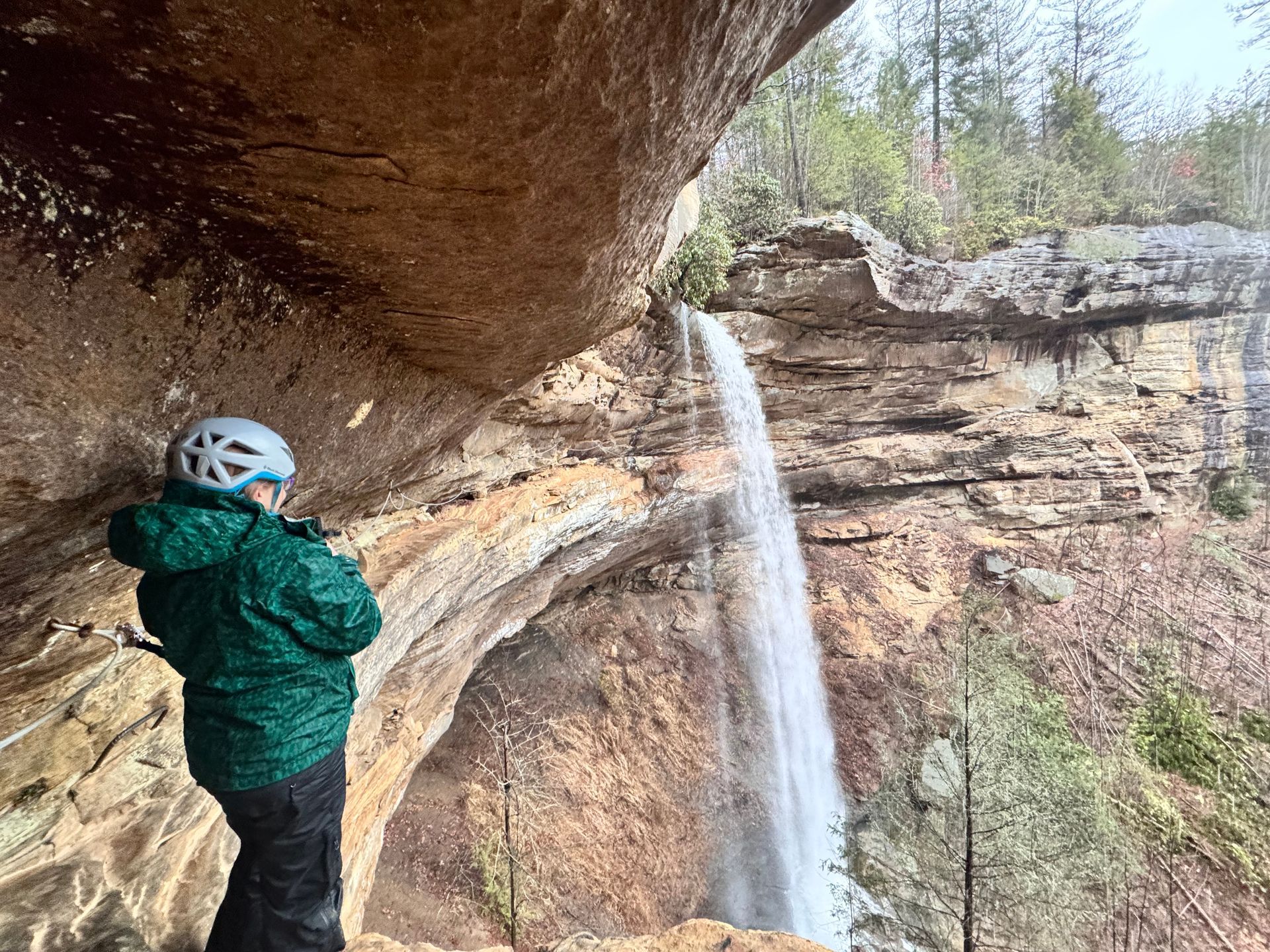 Climbing guide looks at waterfall in the Red River Gorge