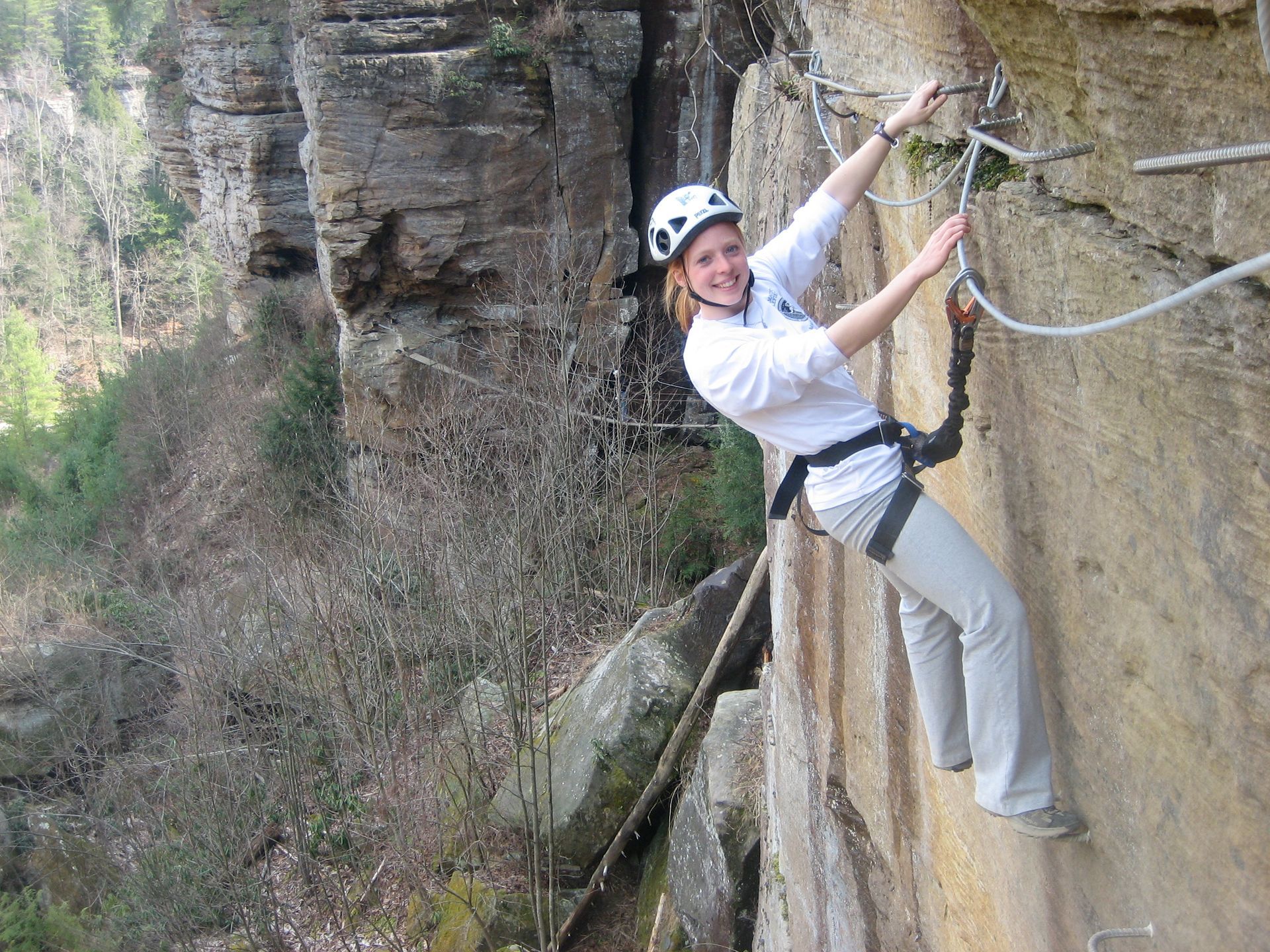 climber smiling of red river gorge via ferrata