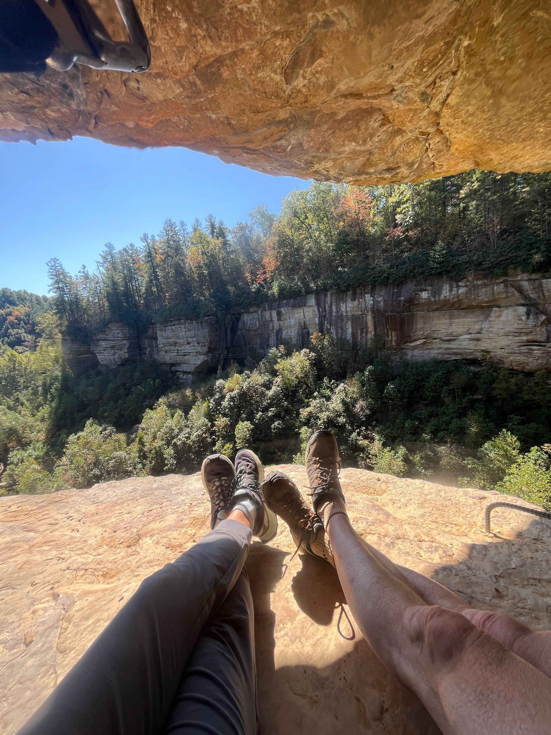 via ferrata climbers rest peacefully overlooking kentucky valley