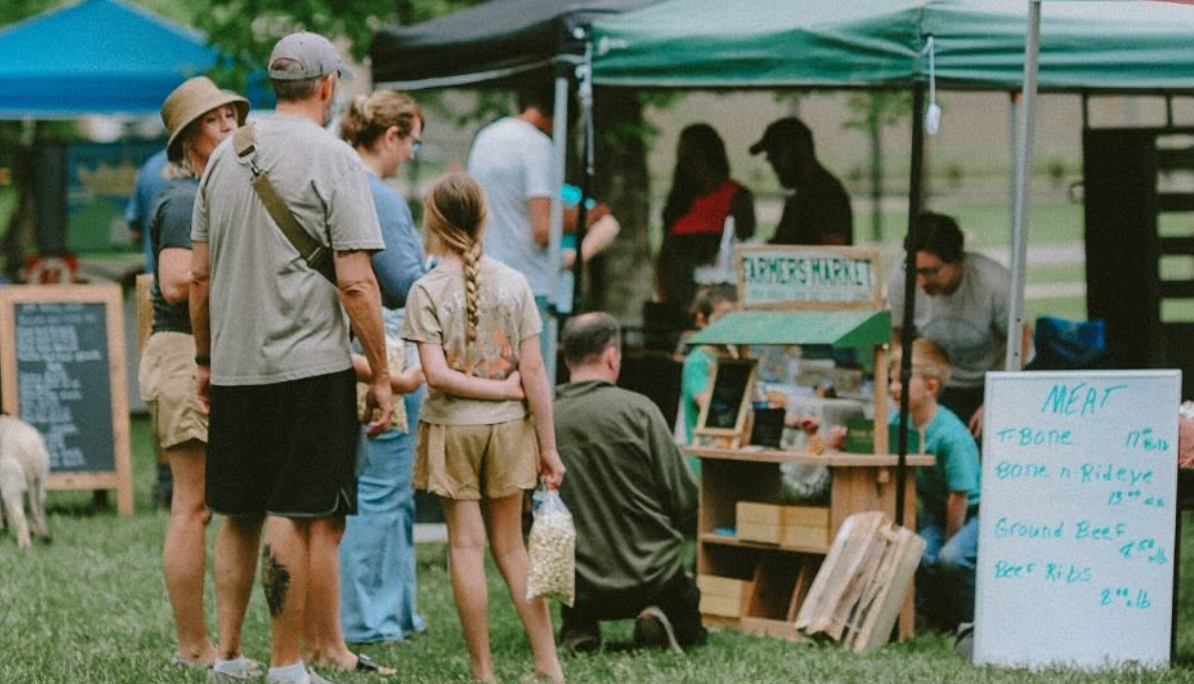 excited tourists explore the red river gorge farmers market