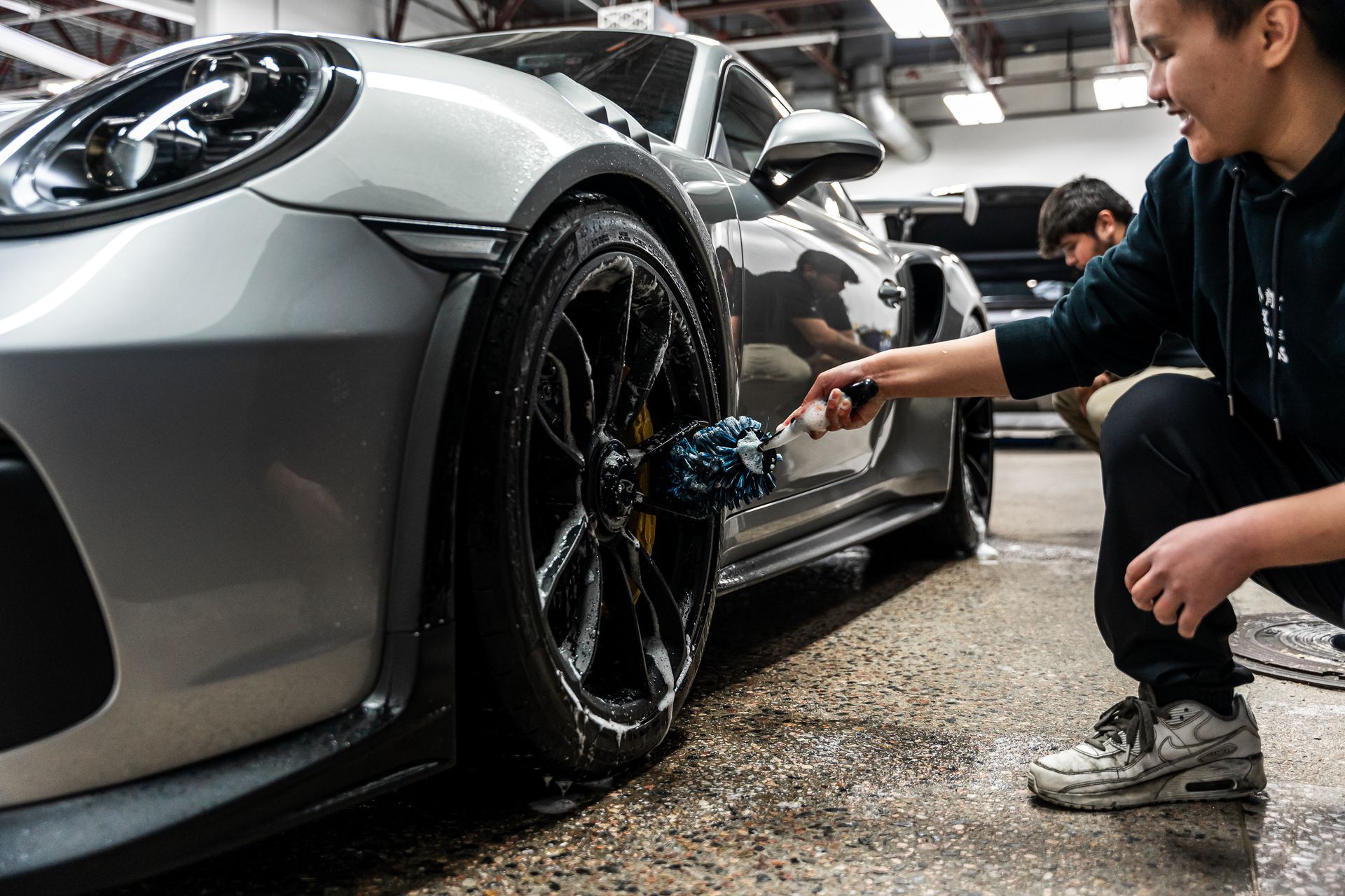 Cleaning wheels with barrel brush