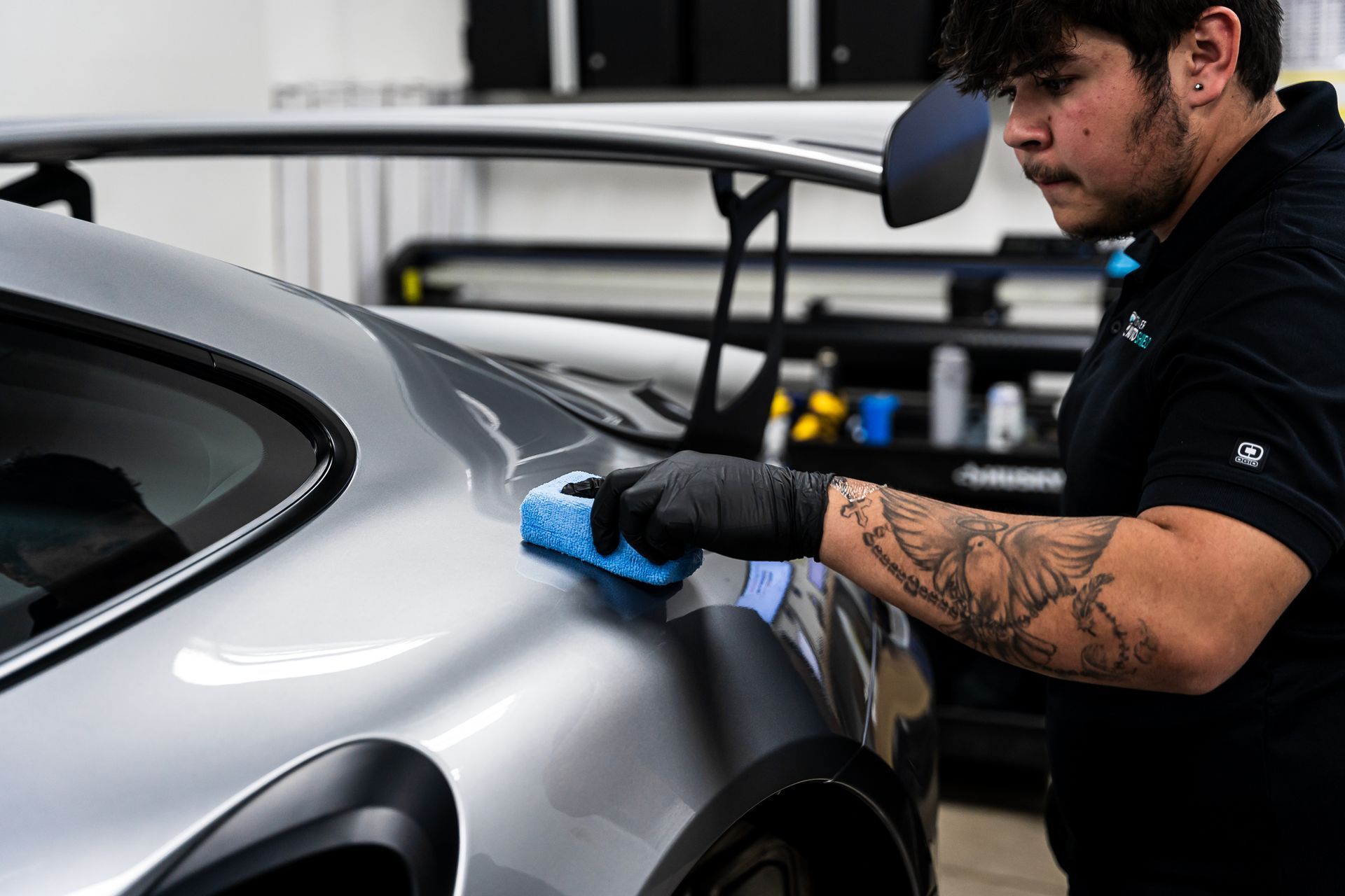 Installing coating on rear quarter panel