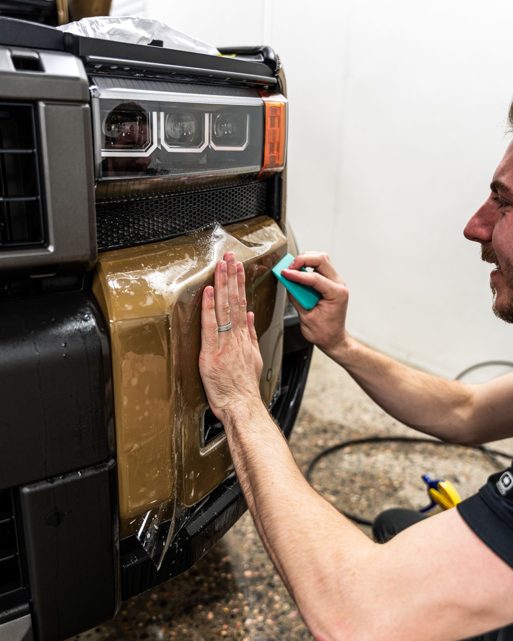 paint protection film installation of a car's bumper