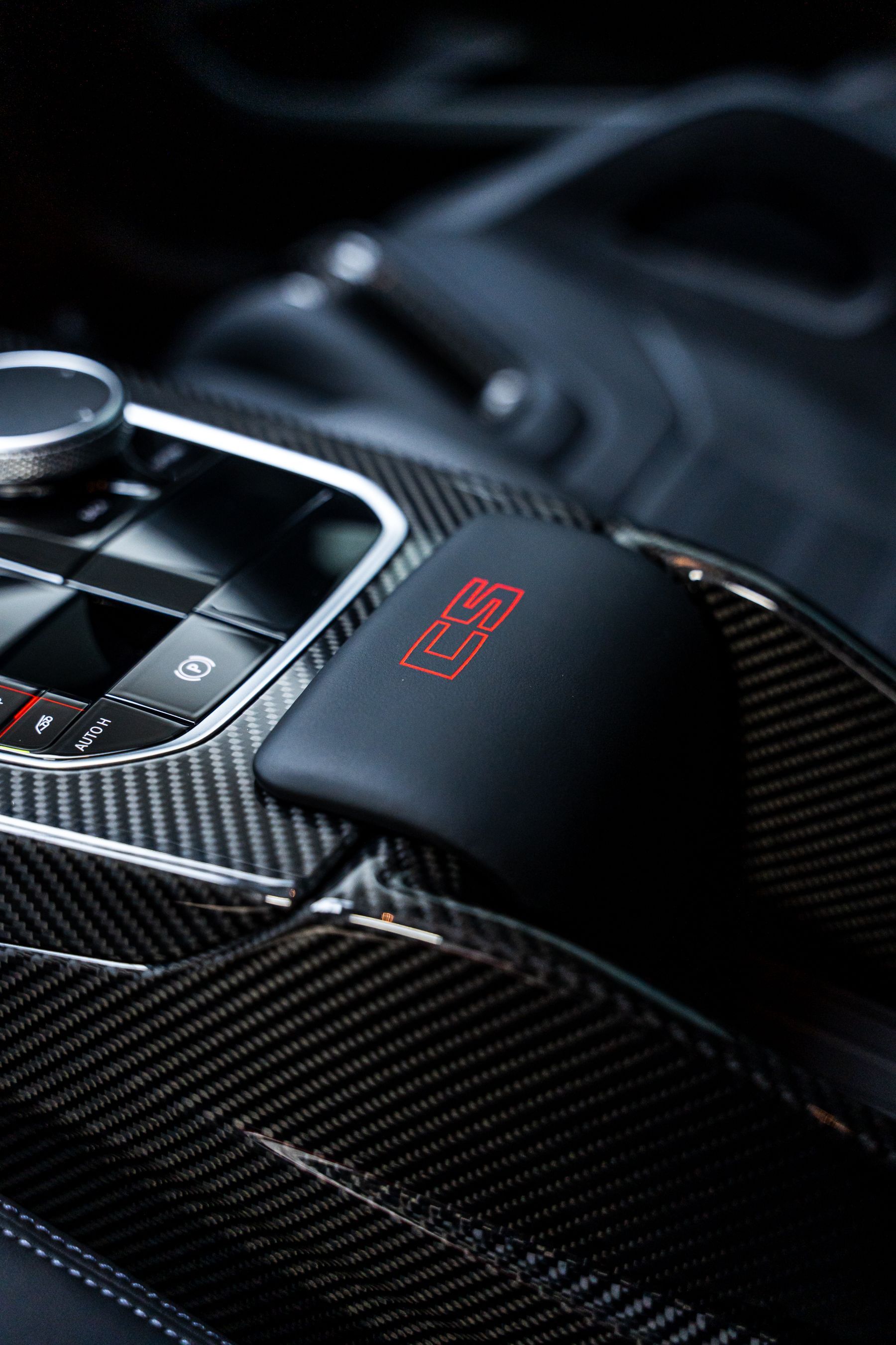 Carbon fiber car console with red