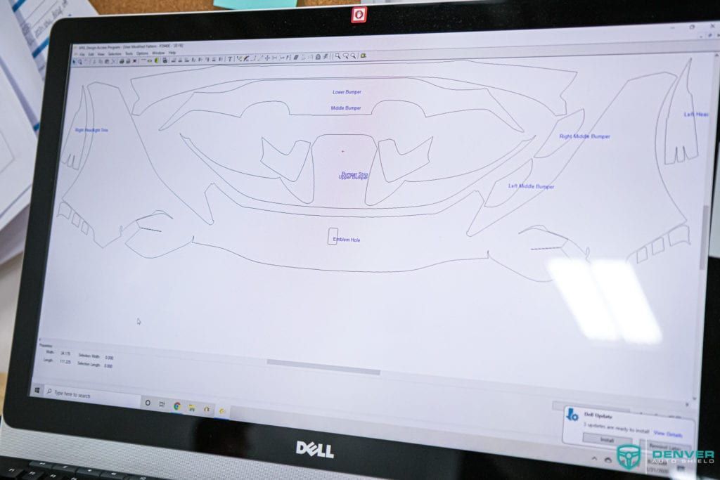 A dell laptop with a drawing on the screen