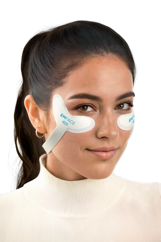 Patient receiving EMFACE eye treatment