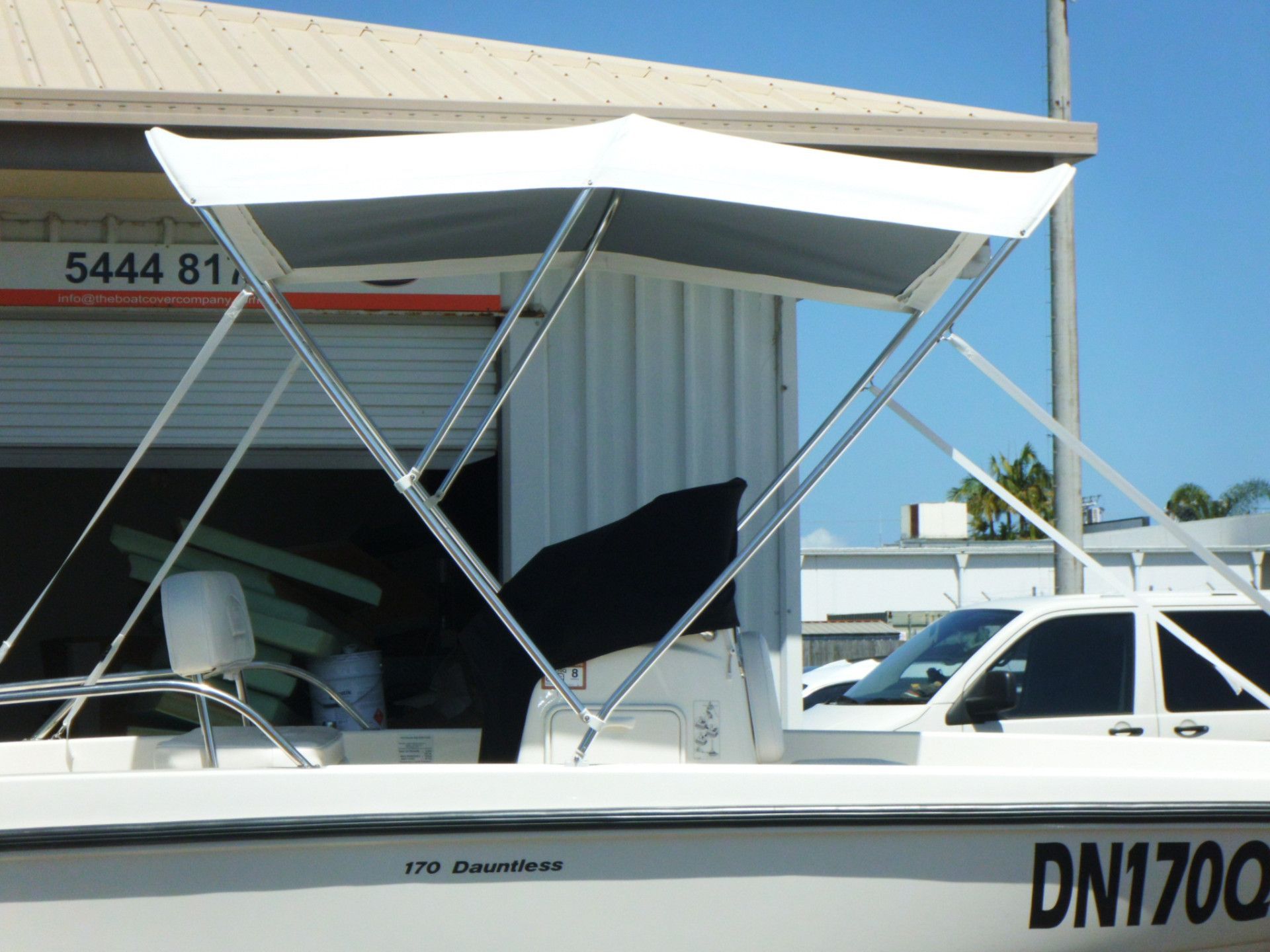 White Boat With a White Sunshade on a Sunny Day — The Boat Cover Company In Buddina, QLD
