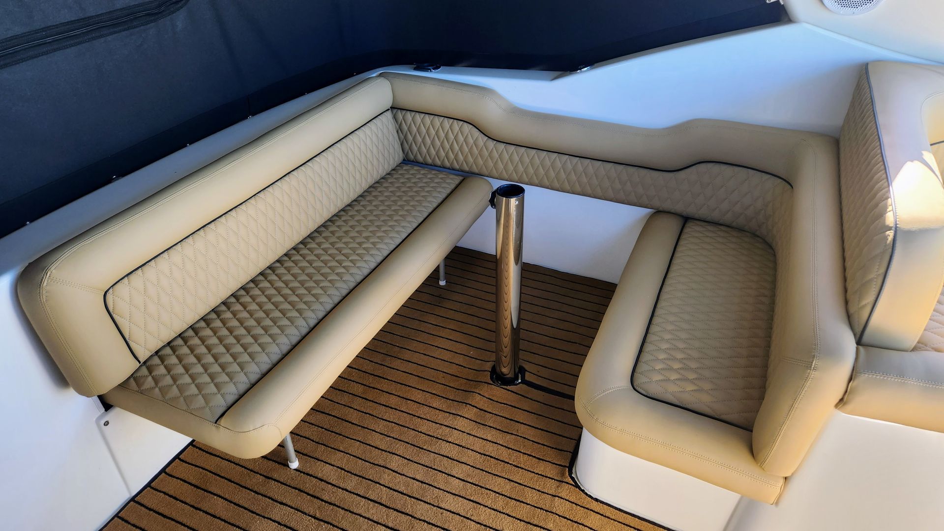 A Boat With a Couch and a Table on the Deck — The Boat Cover Company In Buddina, QLD