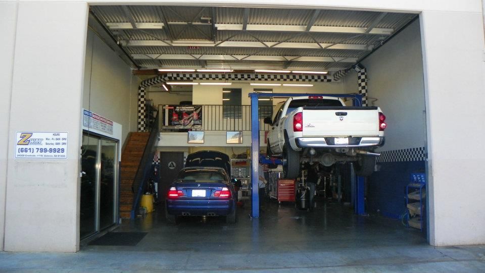 Zway Automotive Service Bay With Vehicles On Lifts | Zway Automotive