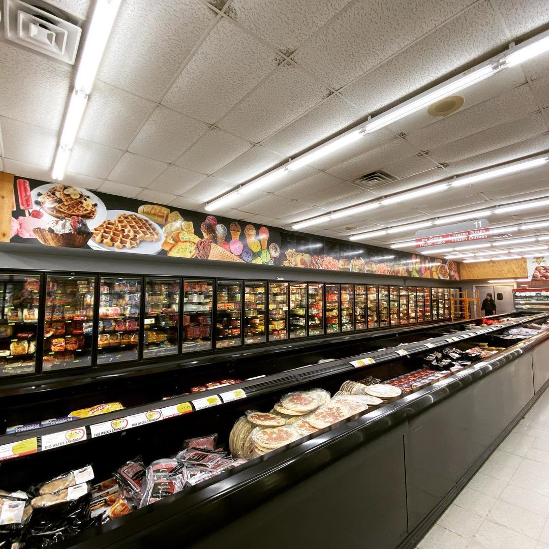 The inside of a grocery store filled with lots of food