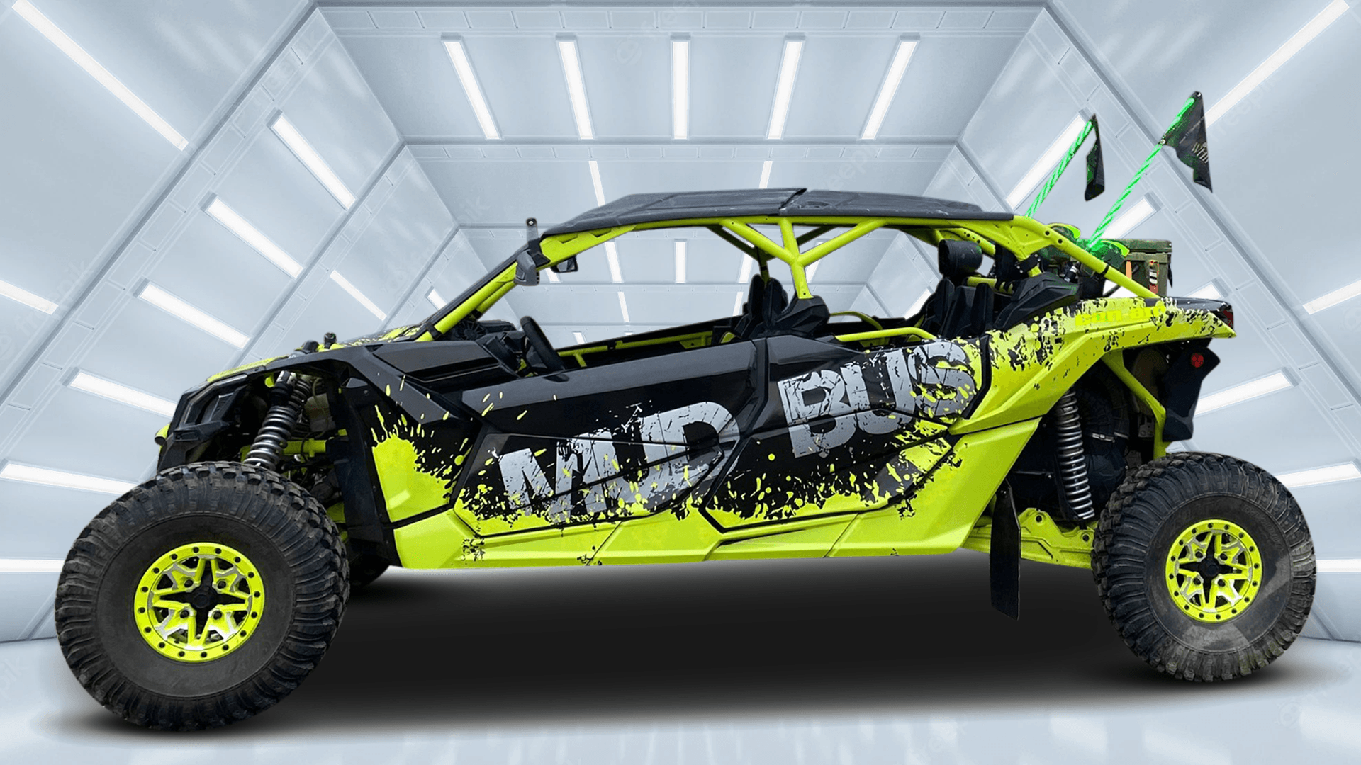 A yellow and black atv is parked in a room.