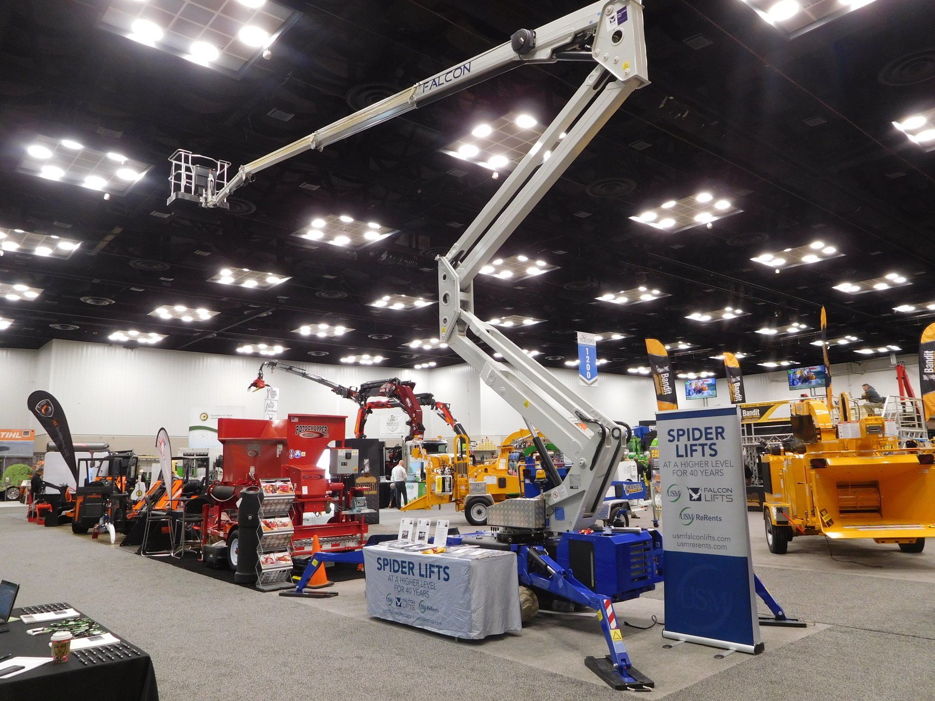 A large room filled with lots of machinery and a sign that says ' under lift ' on it