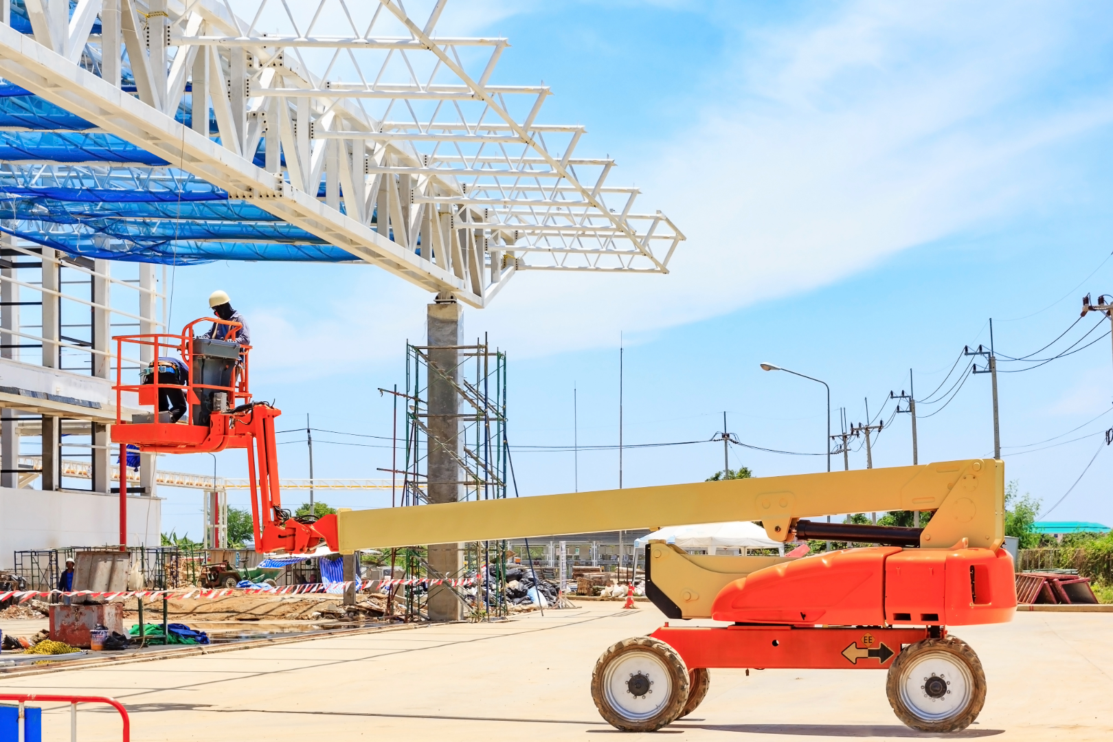 man lift telescopic boom crane outdoor turntable at the construction site
