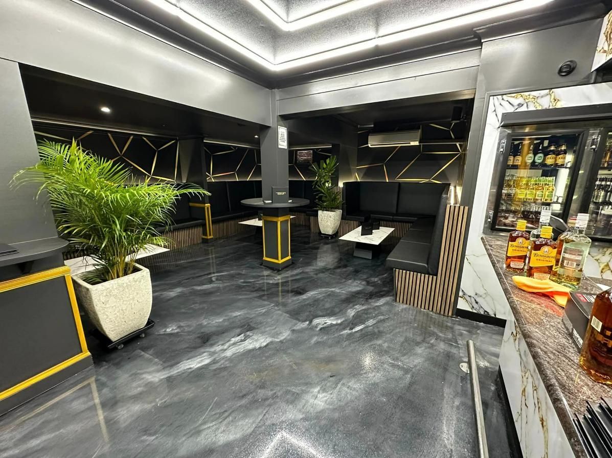 Interior Of The  Cocktail Bar With Black Chairs — Cairns Vinyl & Canvas in Bungalow, QLD