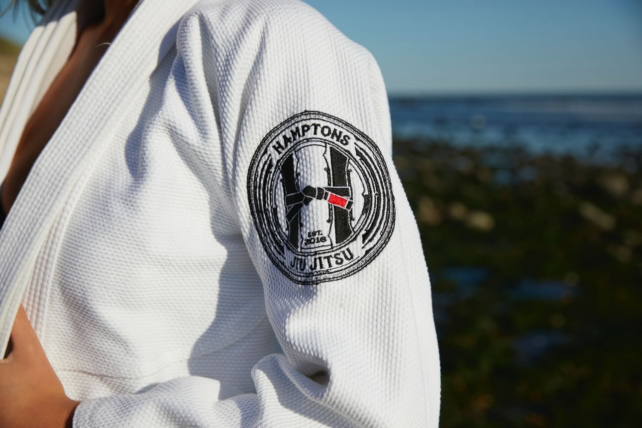 Adults practicing beginner Brazilian Jiu-Jitsu drills at Hamptons Jiu-Jitsu in Southampton, NY.