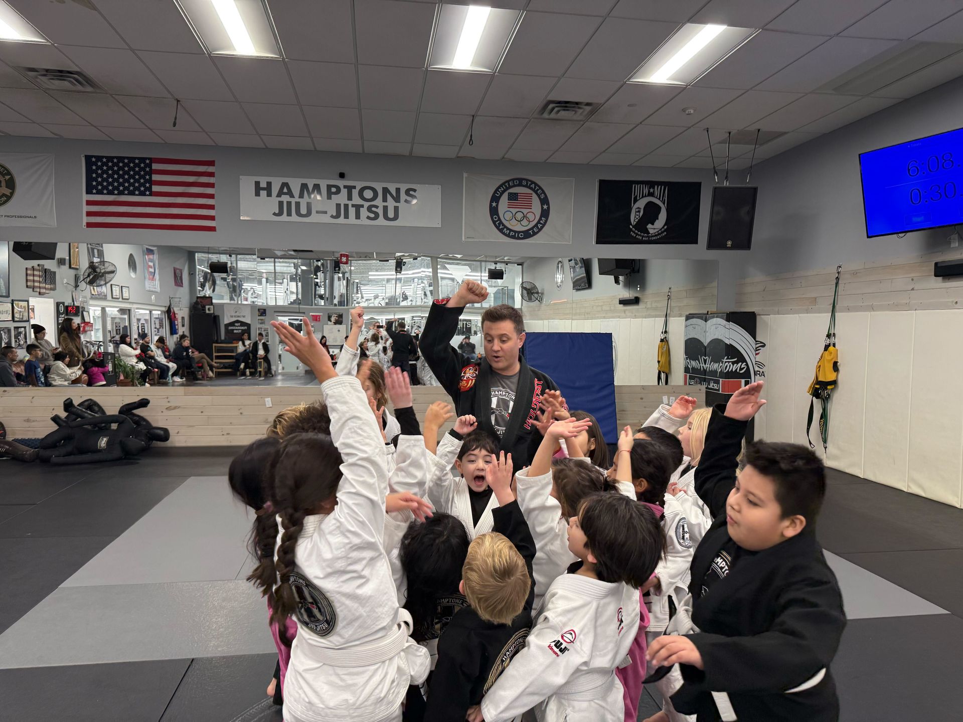 Kids practicing safe grappling drills at Hamptons Jiu-Jitsu in Southampton, NY to build confidence.