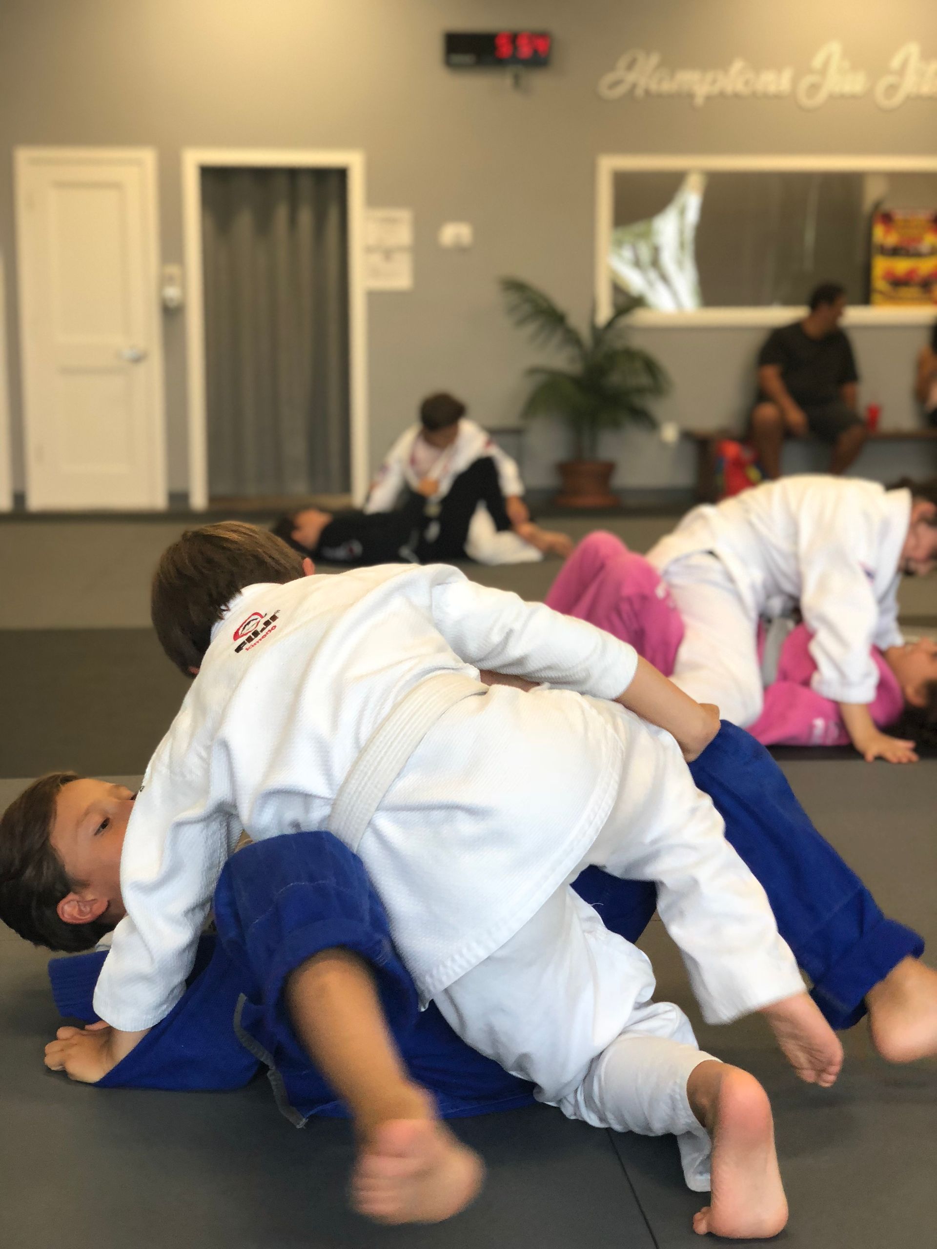 Students practice grappling fundamentals at Hamptons Jiu-Jitsu in Southampton, NY, building focus.