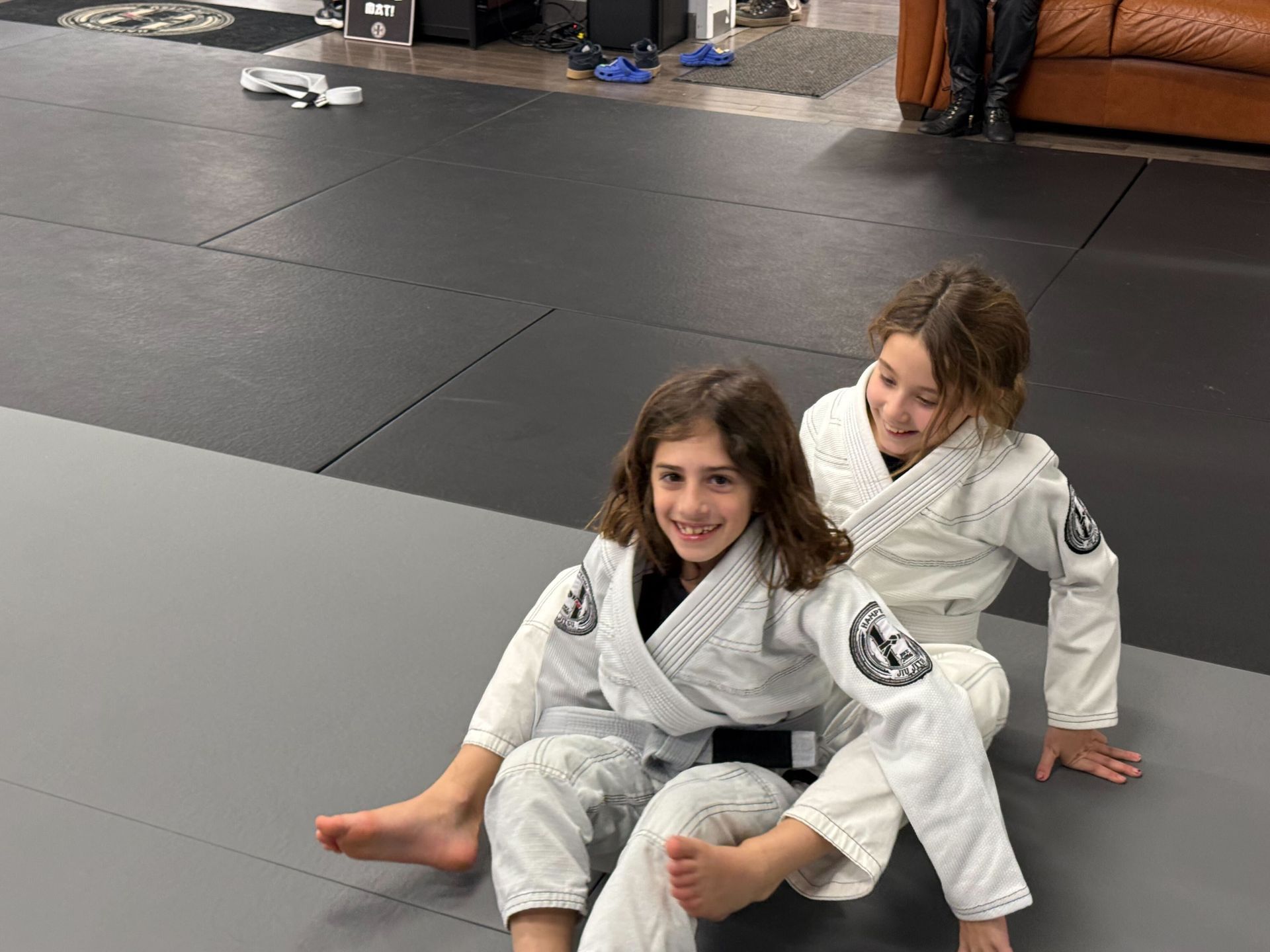Teens practice controlled grappling drills at Hamptons Jiu-Jitsu in Southampton, NY, building strength and resilience.