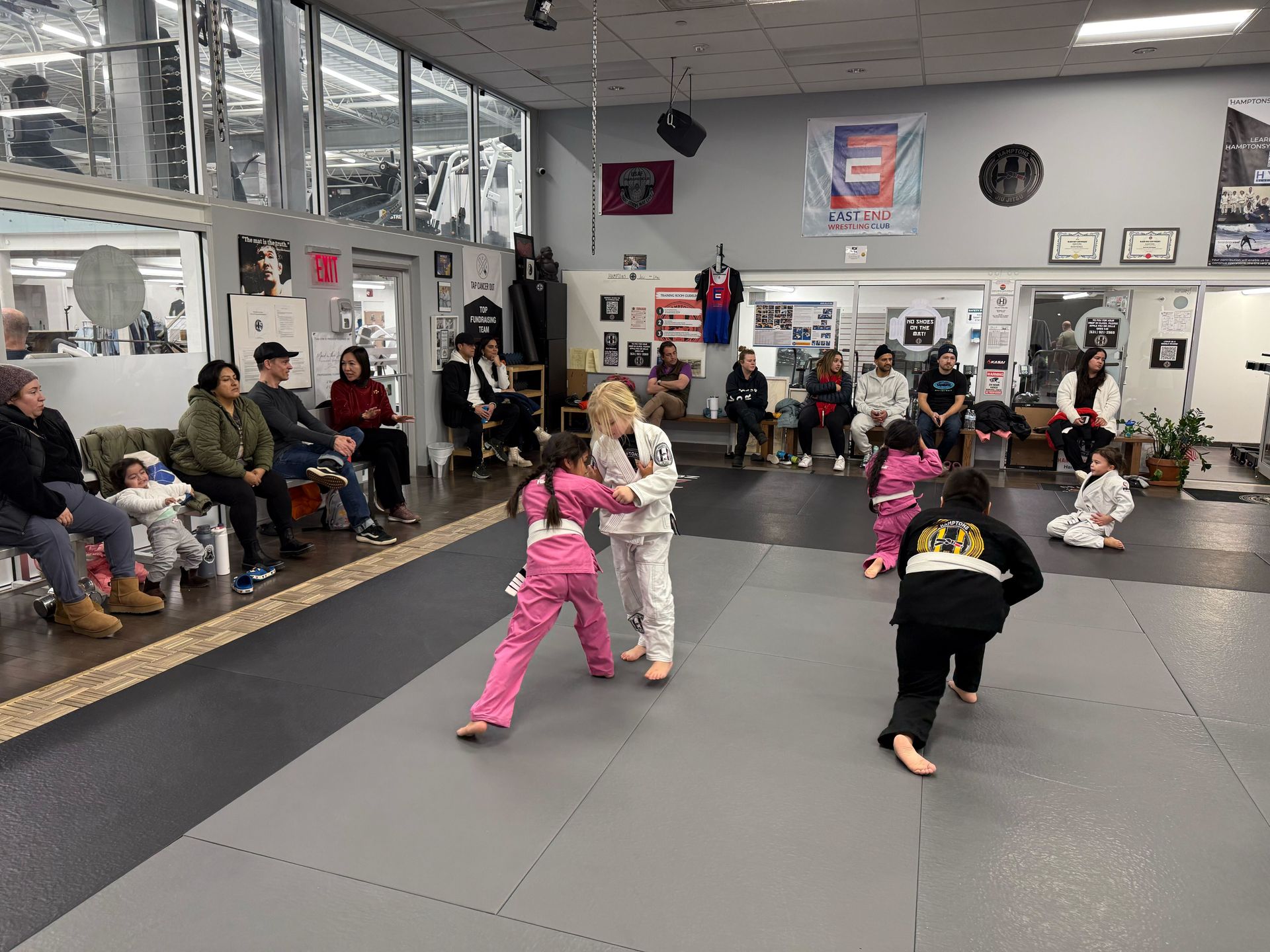 Kids practice partner drills at Hamptons Jiu-Jitsu in Southampton, NY, building social confidence.