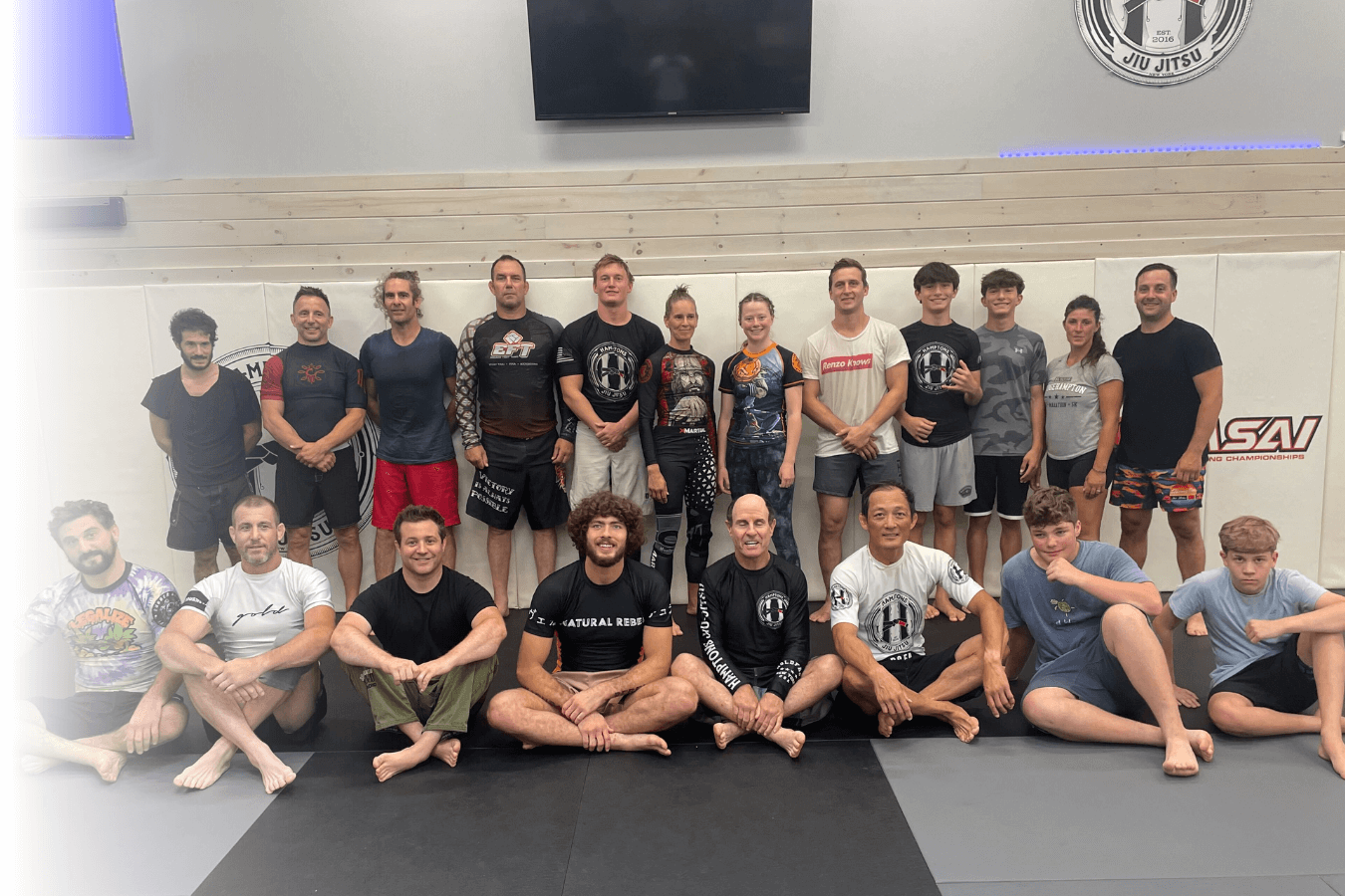 # How Jiu Jitsu in Southampton Inspires Healthy Habits for Busy Adults
## A few hours on the mats each week can quietly reorganize your sleep, stress, and energy - without adding another complicated “plan” to your calendar.
Busy adults in Southampton usually do not need another lecture about health. You already know what you should do: move more, eat better, sleep longer, stress less. The hard part is consistency, especially when work, family, and social commitments stack up fast. That is where jiu jitsu fits in a surprisingly practical way.
We see it all the time: when you train jiu jitsu, you do not just “work out.” You start building a routine that makes other healthy choices easier. People show up for the skill, the community, and the challenge, and somewhere along the way, better habits begin to stick.
## Why jiu jitsu works when traditional fitness plans fail
Most fitness programs rely on willpower and vague goals. Jiu jitsu gives you something more specific: a craft to learn. Each class has a purpose, a beginning and an end, and immediate feedback. You either improve your timing, position, and escapes, or you do not. That clarity matters when your schedule is packed and your attention is split.
There is also an enjoyment factor that is easy to underestimate. Research on martial arts style activities has highlighted that “exercise you enjoy” is more likely to become a sustainable behavior. In other words, if you actually like what you are doing, you are far more likely to keep doing it. We structure training so you can feel progress early, which helps you stay consistent even during busy weeks.
From a health standpoint, consistent training can support cardio-respiratory improvement and stress regulation. Studies on active training groups in grappling style programs have shown reductions in blood pressure and pulse rate over time. We never promise medical outcomes, but we do see that regular training often pairs with calmer baseline stress and better day-to-day energy.
## The Southampton lifestyle challenge: high demand, low time
Southampton is full of high performers. That can mean long hours, high responsibility, lots of driving, and a calendar that gets booked out weeks ahead. The wellness culture here is strong, but time is the real bottleneck. You might have motivation, and still feel like you cannot fit fitness into your life without sacrificing something else.
Jiu jitsu Southampton training solves that problem in a realistic way because it is time efficient. You can train a few times per week and still get meaningful benefits, because each session combines strength, conditioning, mobility, coordination, and mental engagement. It is not a separate cardio day, a separate strength day, and a separate “stress management” day. It is all in one room.
We also recognize that adults need flexibility. Your best routine is the one you can repeat, not the one that looks perfect on paper. That is why our class schedule is designed for real life, including people who can only commit to certain days or who need a predictable rhythm to stay consistent.
## The habit loop: how jiu jitsu creates momentum
Healthy habits tend to form through a loop: cue, routine, reward. Jiu jitsu naturally provides all three.
Your cue might be as simple as leaving work and driving to class. The routine is the structured training session. The reward is immediate: you learned something, you handled a tough round, you got a little better. That reward is not abstract like “maybe I will be healthier next year.” It is right there, class by class.
Over time, that loop spills into daily life. When you train, you start to notice what affects your performance, and you begin adjusting without forcing it. People often clean up sleep because they want to feel sharp on the mats. They hydrate more because cramps are not fun. They stop skipping meals because rolling on an empty stomach feels terrible. It is practical, not preachy.
## What busy adults actually gain from consistent training
We focus on building skills, but the lifestyle benefits show up quickly when you train consistently. Here are a few of the most common “side effects” busy adults notice after starting jiu jitsu:
• Better sleep quality, because your body and nervous system finally get a clear signal to downshift at night
• More daily movement, including improved mobility and less “stuck at a desk” stiffness
• A stronger relationship with food, because you start fueling performance instead of chasing quick fixes
• Lower background stress, since training gives you a controlled place to practice pressure and recover from it
• More confidence in your body, not just how it looks, but what it can do in a real situation
• A clearer sense of progress, because your improvements are measurable in technique and timing
None of that requires perfection. It requires reps and a routine you can actually maintain.
## Brazilian jiu jitsu in Southampton: a skill first approach that keeps you coming back
One reason brazilian jiu jitsu in Southampton fits busy adults is that it stays interesting. There is always another layer to learn: escapes, guard retention, passing sequences, transitions, submissions, and the strategy that connects it all. That variety makes it easier to stay consistent than a repetitive gym routine.
We also keep training structured so you are not guessing what to do. A typical class includes technique instruction, drilling for repetition, and controlled live rounds where you apply what you learned. That structure is important for habit building because it reduces decision fatigue. You just show up, and we guide the process.
And yes, jiu jitsu is demanding, but it is scalable. You can train at an intensity that matches your current fitness, your age, and your recovery capacity. The goal is progress, not punishment.
## Managing stress the adult way: pressure, problem solving, and reset
Stress management advice often sounds nice but feels unrealistic. Breathe. Meditate. Take a walk. Those things can help, but many adults need something more physical, more grounding, and honestly more engaging.
Jiu jitsu gives you real pressure in a controlled environment. Someone is trying to pass your guard or control your posture, and you have to stay calm enough to solve the problem. That practice transfers. You start noticing that stressful moments at work do not spike you as hard, because you have trained your response: assess, breathe, act, adjust.
There is also the simple benefit of a hard reset. When you train, you are not scrolling, multitasking, or half-listening to a meeting. You are present. For busy adults, that can feel like a mental vacation that also happens to improve your fitness.
## Time efficiency: what “consistent” looks like for a packed schedule
A common fear is that you have to train every day for jiu jitsu to “work.” You do not. Consistency is about repeatability. For many adults, two to three classes per week is enough to build skill and see meaningful fitness benefits.
Here is a simple way we help students think about it:
1. Start with two classes per week for the first month to establish the routine
2. Add a third class only when your recovery and schedule feel stable
3. Protect one rest day after harder sessions so your body adapts instead of breaking down
4. Use short mobility work at home to stay loose, especially hips, neck, and upper back
5. Track attendance, not perfection, because showing up is the habit that drives everything else
That approach respects real life. It also keeps you training long term, which is where the real transformation happens.
## Injury prevention and longevity: training smart, not reckless
Any physical activity has risk, and grappling is no exception. The good news is that smart training culture reduces problems dramatically. We coach you to tap early, prioritize position, and build intensity gradually. Most preventable injuries come from ego, rushing, or skipping warm-ups, so we stay consistent with fundamentals and safety habits.
We also encourage recovery like adults, not like teenagers. Hydration, sleep, and basic mobility work go a long way. If something feels off, we would rather you scale down and keep training than push through and disappear for months. Longevity is a real goal, especially for busy adults who cannot afford downtime.
## Accountability that does not feel like pressure
Some people hate the idea of accountability because it feels like guilt. We do it differently. The room itself becomes your accountability. When you train with the same faces and you have a coach who remembers what you worked on last week, showing up becomes easier.
This is also why jiu jitsu can be more effective than solo workouts for habit building. If you are tired after work, it is easy to talk yourself out of the gym. It is harder to skip when you know you have training partners expecting you, and you know you will leave feeling better.
## Competition level coaching, everyday adult application
While many of our students train for health, confidence, and skill, we also bring a performance mindset into the room. Our academy has documented participation in IBJJF competitions, including team achievements, medal statistics, and top fighter results. That matters even if you never compete, because a competition tested approach tends to be organized, detail-oriented, and honest about what works.
It also aligns with broader trends: jiu jitsu continues to grow alongside the combat sports industry, and high-demand areas support premium coaching through private sessions and structured programs. In Southampton, that demand is real, and it is one reason we keep our instruction sharp and our curriculum intentional. You are busy, so your training time needs to count.
## Take the Next Step
If you want a routine that supports your health without turning into another stressful obligation, jiu jitsu is a strong answer for busy adults in Southampton. We keep training structured, scalable, and skill-focused so you can build momentum even when life is full.
When you are ready, we would love to meet you on the mats at Hamptons Jiu-Jitsu. Our goal is simple: help you train consistently, learn real skills, and leave class feeling like you did something meaningful for yourself.
Call to action 1: If you want to explore getting started, visit https://hamptonsjiujitsu.com/ and see how we set up new students for a smooth first class.
Call to action 2: To find times that fit your work and family calendar, check the class schedule page at https://hamptonsjiujitsu.com/schedule.
Call to action 3: If you are curious about our training philosophy and what to expect when you walk in, the about page is a good place to start at https://hamptonsjiujitsu.com/about.
Meta title: Jiu Jitsu in Southampton NY | Hamptons Jiu-Jitsu Healthy Habits
Meta description: Build healthy routines with jiu jitsu in Southampton, NY. Train smarter, manage stress, and stay consistent at Hamptons Jiu-Jitsu.
Alternate titles:
1. Jiu Jitsu Southampton: The Busy Adult Guide to Building Better Habits
2. How Brazilian Jiu Jitsu in Southampton Fits Real Life and Improves Health
3. Jiu Jitsu for Busy Professionals in Southampton: Habits That Stick
IMAGE METADATA
Image Title: Hamptons Jiu-Jitsu Jiu Jitsu in Southampton, NY
Tags: martial arts, jiu jitsu, Southampton, New York
Alt Text: Adults training jiu jitsu at Hamptons Jiu-Jitsu in Southampton, NY, building fitness and stress relief (110 characters)
Geo Tag:
Location Name: Southampton Village, Southampton
Latitude: 40.8843
Longitude: -72.3895
Suggestion:
Article 1
- Title: 7 Surprising Ways Adult Jiu Jitsu Boosts Health and Reduces Stress
- URL: https://www.hamptonsjiujitsu.com/7-surprising-ways-adult-jiu-jitsu-boosts-health-and-reduces-stress
- Key Topics: adult BJJ health benefits, stress reduction, mobility and flexibility, safe progressive training, consistency for busy adults
Article 2
- Title: 10 Reasons Adults Are Choosing BJJ for Fitness
- URL: https://www.hamptonsjiujitsu.com/10-reasons-adults-are-choosing-bjj-for-fitness
- Key Topics: fitness for adults, stress relief, confidence/self-defense, mental resilience, community and accountability
Article 3
- Title: Why Jiu Jitsu Is Becoming the Favorite Workout in Southampton
- URL: https://www.hamptonsjiujitsu.com/why-jiu-jitsu-is-becoming-the-favorite-workout-in-southampton
- Key Topics: jiu jitsu vs gym workouts, time-efficient training, focus and mental reset, Southampton lifestyle fit, adult fitness motivation
Article 4
- Title: How Jiu Jitsu Builds Confidence and Community in Southampton
- URL: https://www.hamptonsjiujitsu.com/how-jiu-jitsu-builds-confidence-and-community-in-southampton
- Key Topics: confidence building, community and belonging, stress relief, adult beginner-friendly training, staying consistent
Article 5
- Title: Starting Jiu-Jitsu - Tips for Beginners
- URL: https://hamptonsjiujitsu.com/starting-jiu-jitsu
- Key Topics: what to expect as a beginner, building a sustainable routine, gym etiquette and culture, getting started safely, consistency basics
