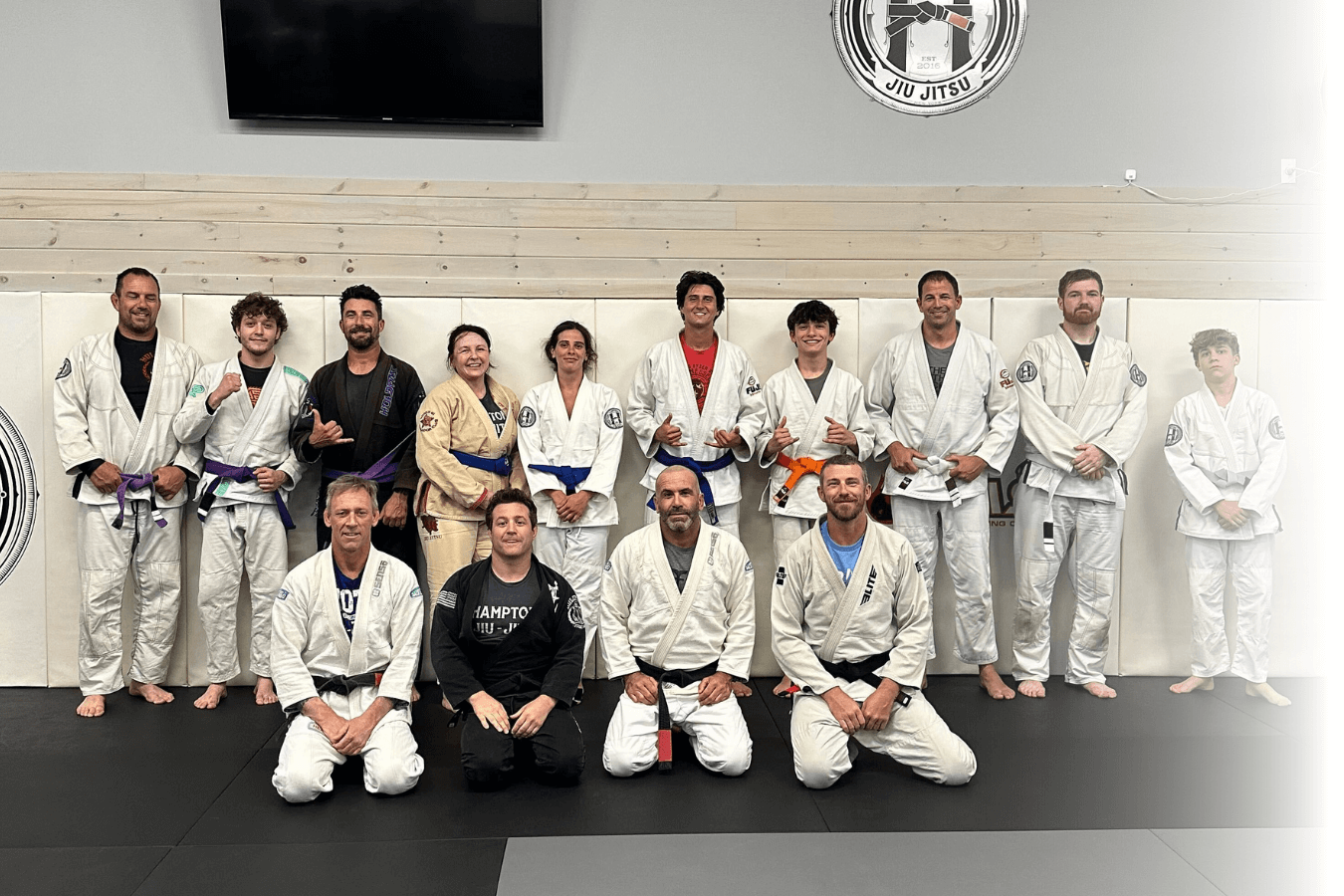 Adults drilling Brazilian Jiu-Jitsu techniques at Hamptons Jiu-Jitsu in Southampton, NY for fitness and focus.
