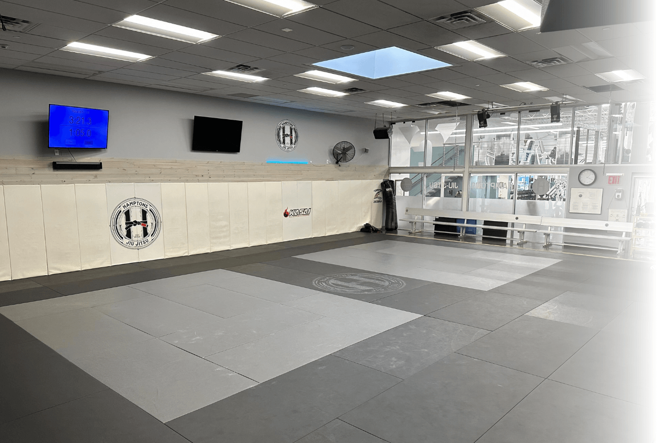 Students practicing calm, controlled jiu jitsu drills at Hamptons Jiu-Jitsu in Southampton, NY for anxiety relief.