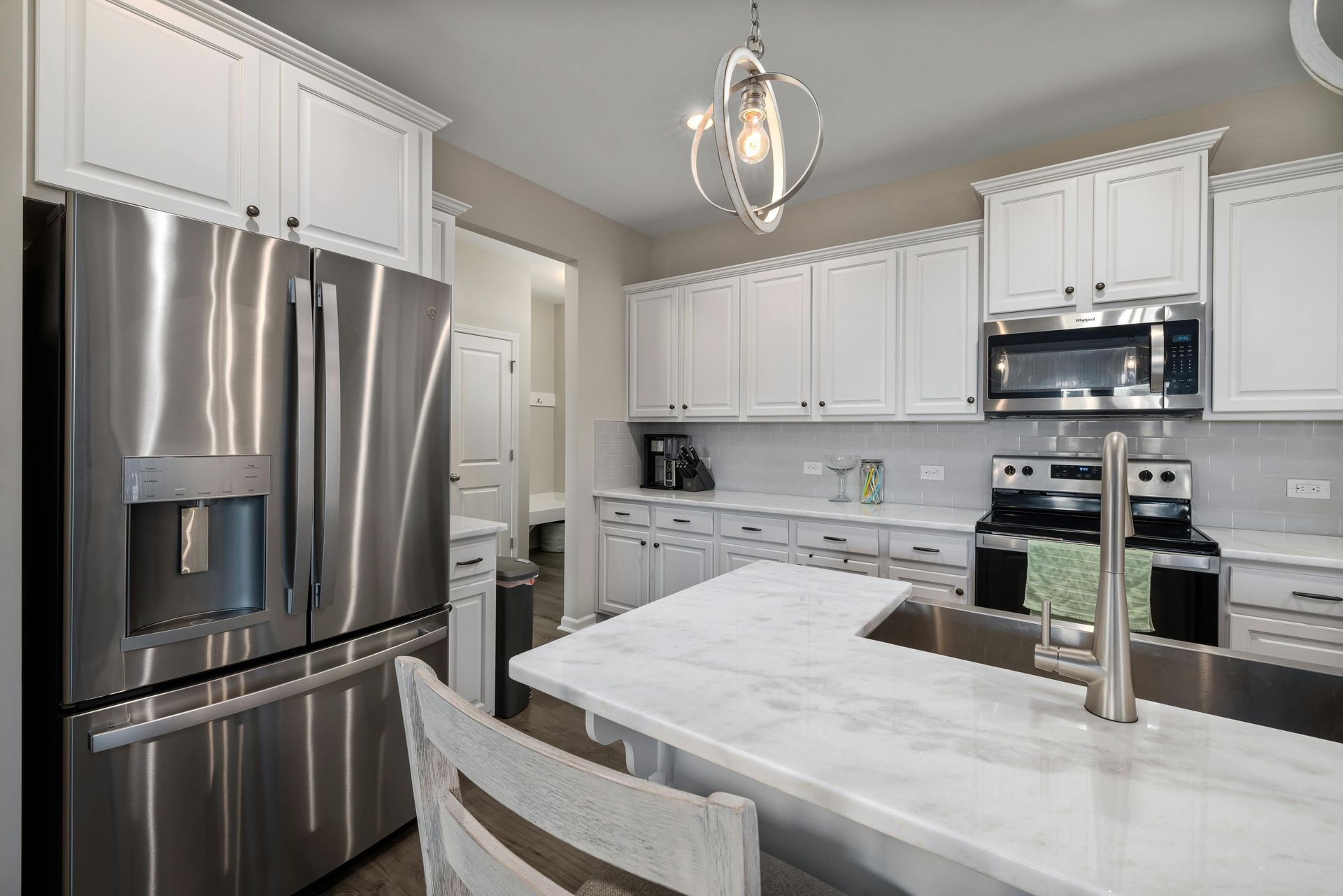 Kitchen island under construction with cutout opening and tools on the countertop